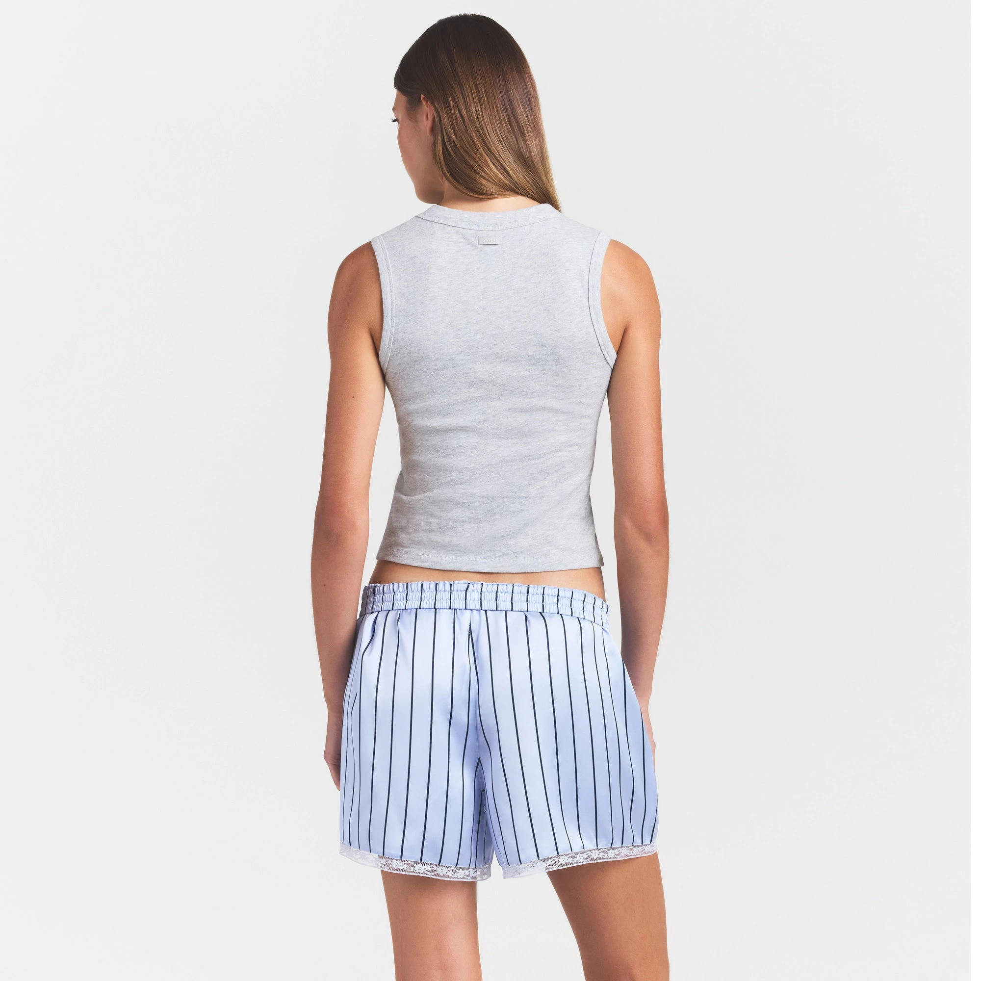 WORN IN JERSEY HIGH CREW TANK | LIGHT HEATHER GREY ON A MODEL SIDE VIEW @ | FOCUS: 0.0, 1.0, 0.9