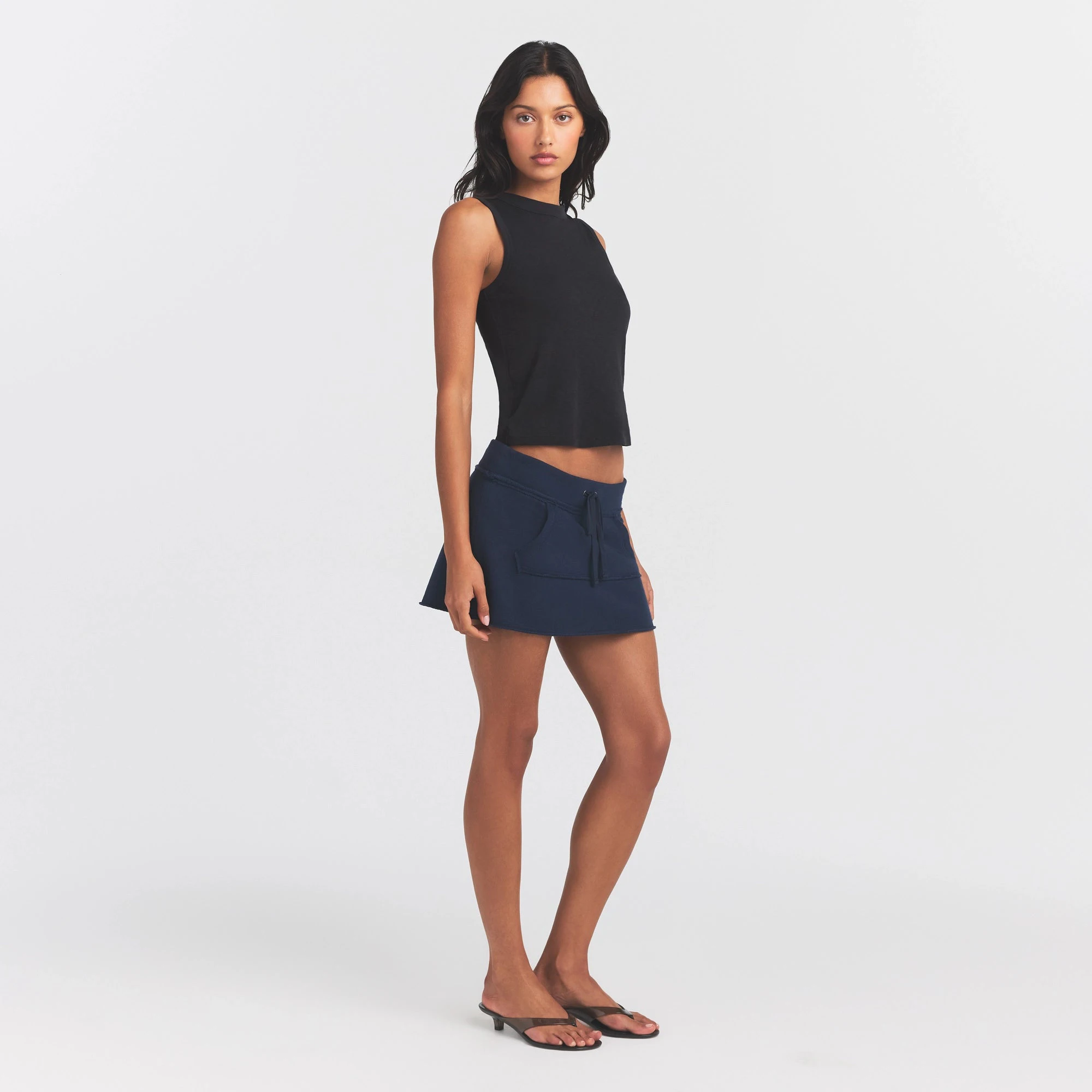 WORN IN JERSEY HIGH CREW TANK | WASHED ONYX ON A MODEL FRONT VIEW @ | FOCUS: 0.0, 1.0, 0.9