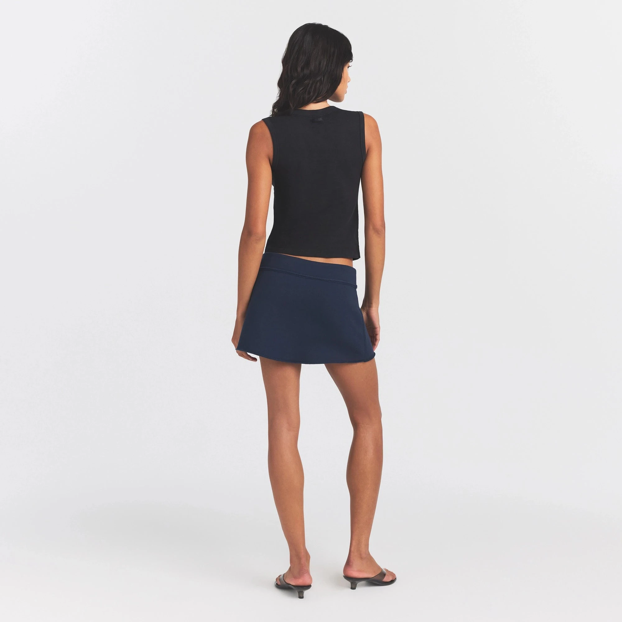 WORN IN JERSEY HIGH CREW TANK | WASHED ONYX ON A MODEL FRONT VIEW @ | FOCUS: 0.0, 1.0, 0.9