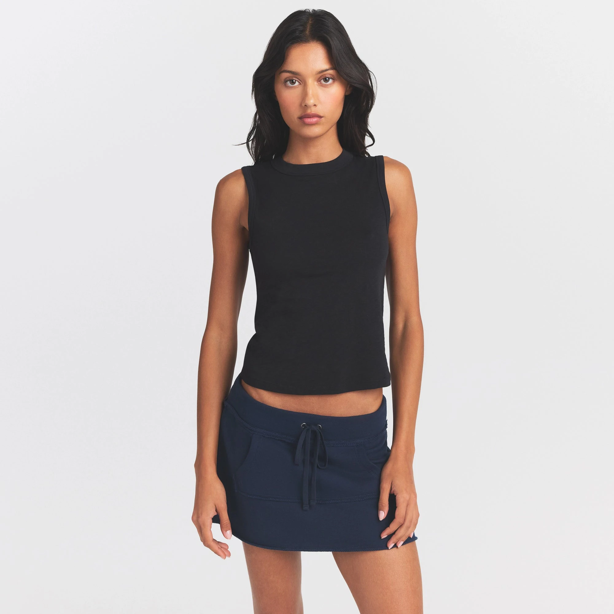 WORN IN JERSEY HIGH CREW TANK | WASHED ONYX ON A MODEL SIDE VIEW @ | FOCUS: 0.0, 1.0, 0.9