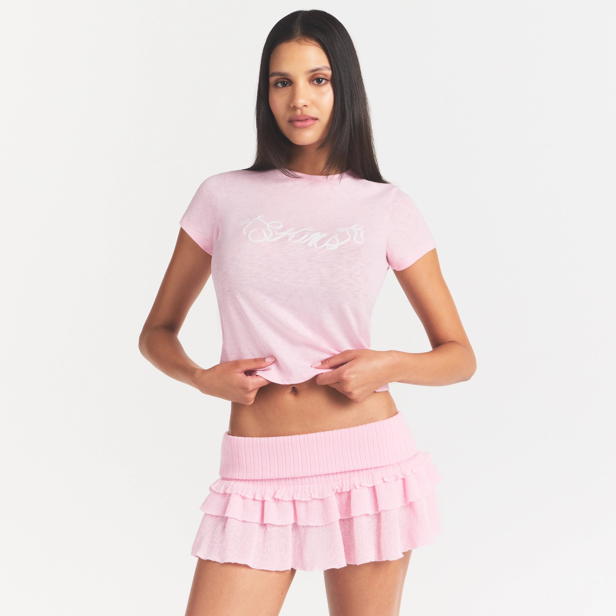 WORN IN JERSEY T-SHIRT | PEONY SKIMS BOW ON A MODEL SIDE VIEW @ | FOCUS: 0.0, 1.0, 0.9