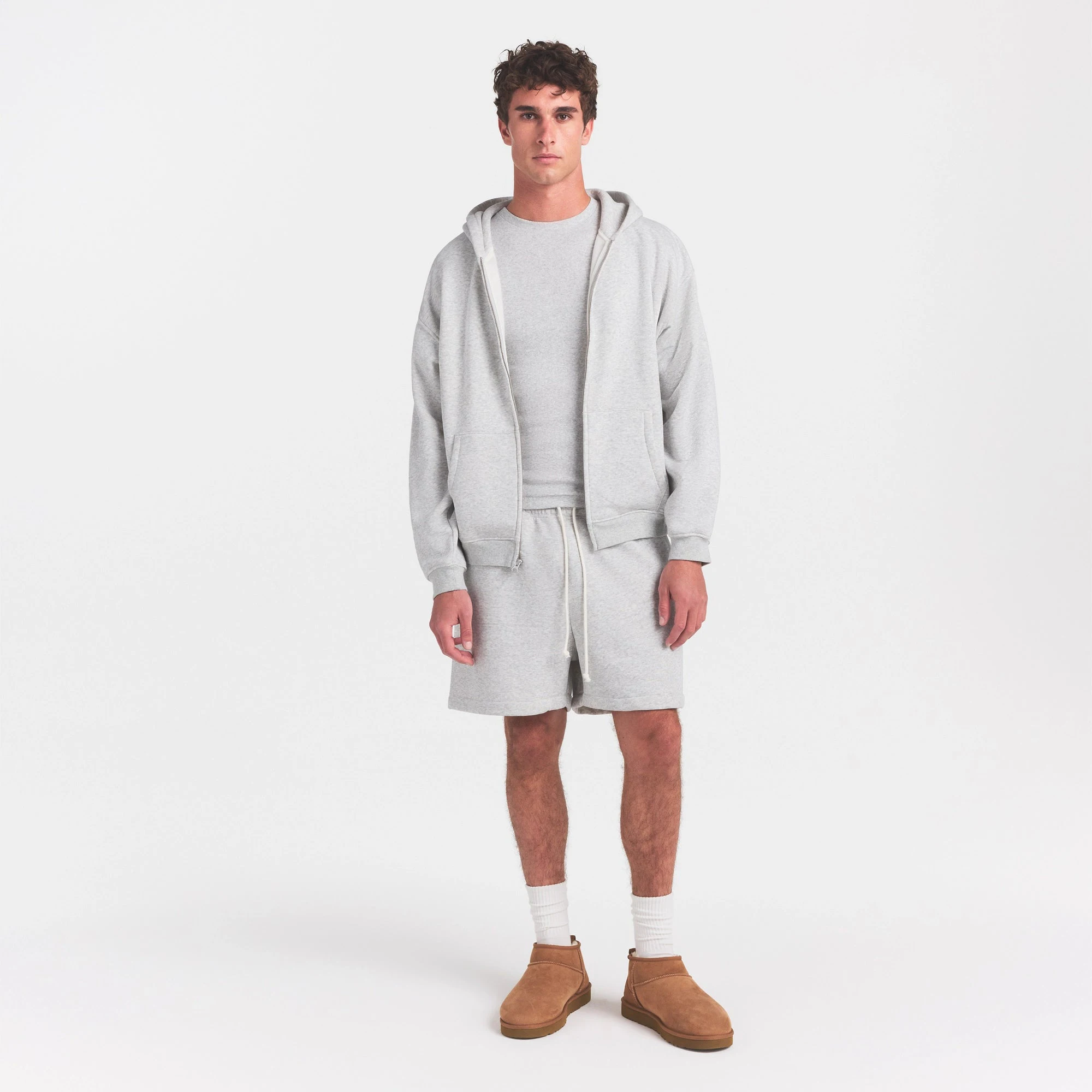 SKIMS COTTON RIB MENS T-SHIRT | LIGHT HEATHER GREY ON A MODEL FRONT VIEW @ | FOCUS: 0.0, 1.0, 0.9