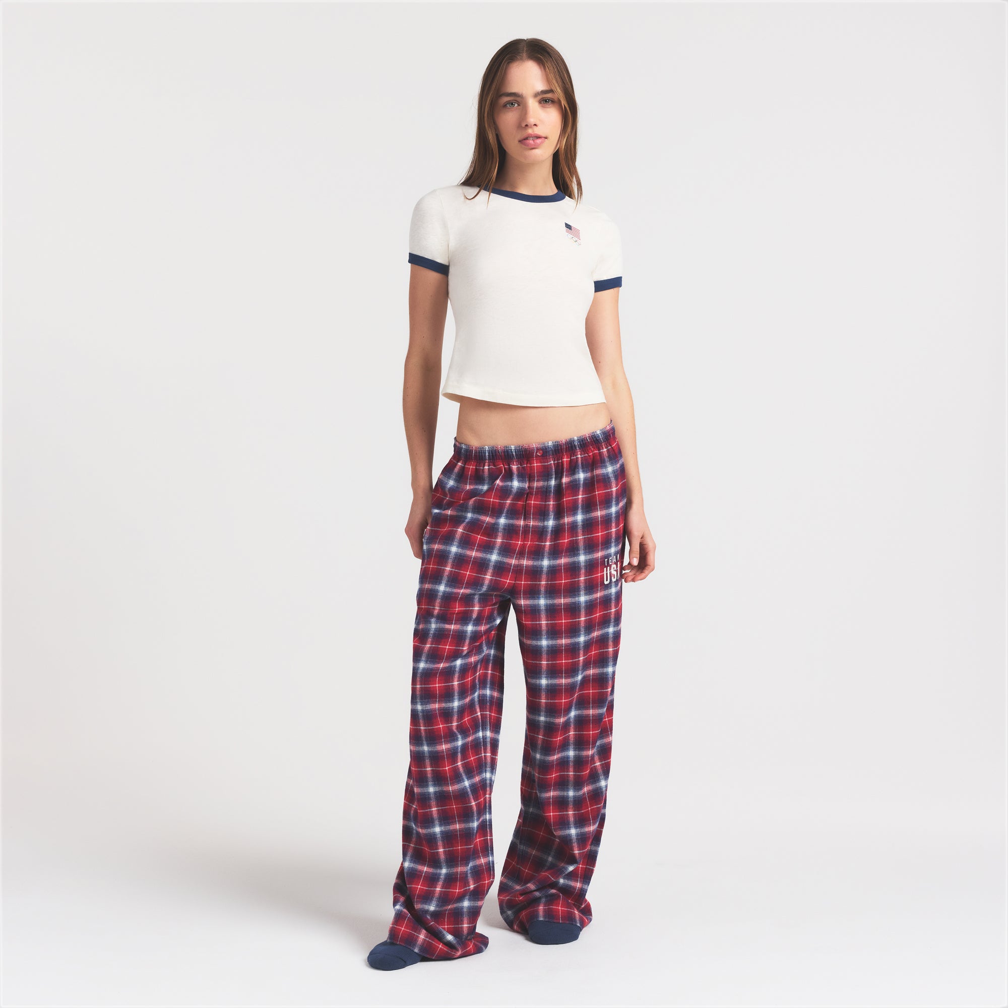 SKIMS FOR TEAM USA WORN IN JERSEY OLYMPIC SHRUNKEN T-SHIRT | ECRU ON A MODEL FRONT VIEW @ | FOCUS: 0.0, 1.0, 0.9