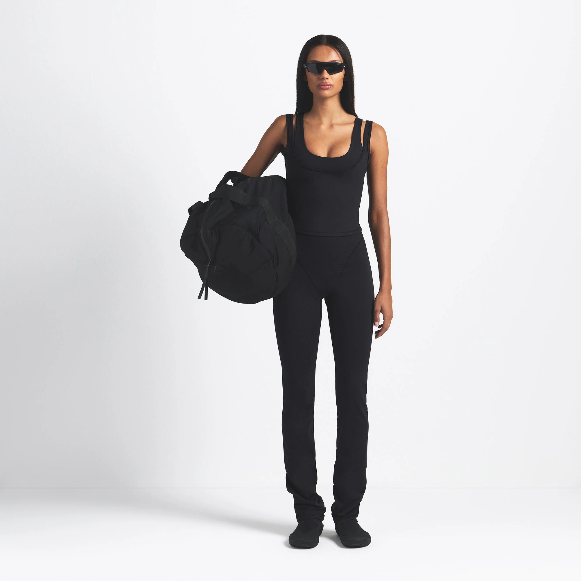 NikeSKIMS MATTE DOUBLE STRAP SCOOP TANK | OBSIDIAN ON A MODEL FRONT VIEW @ | FOCUS: 0.9, 0.1, 0.7