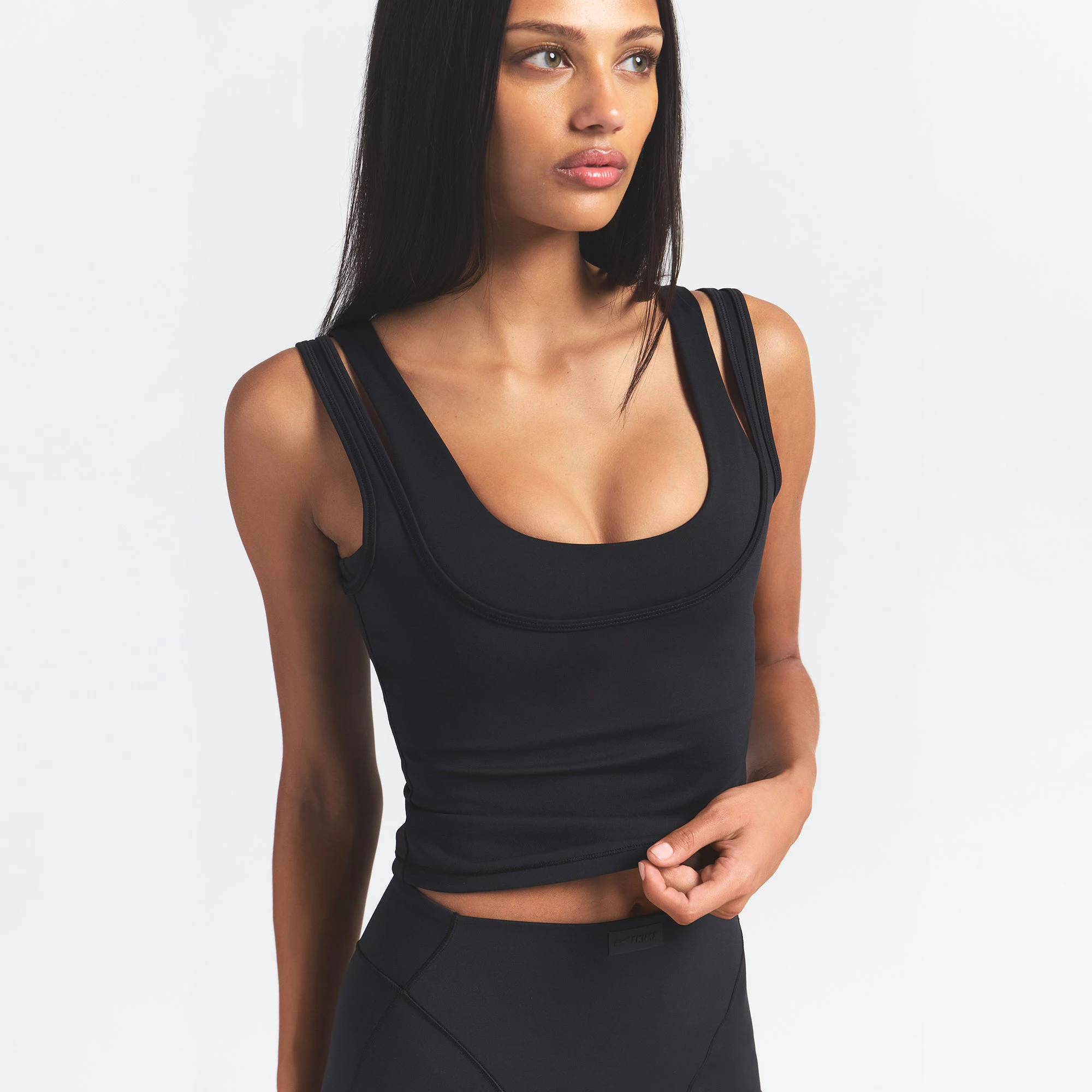 NikeSKIMS MATTE DOUBLE STRAP SCOOP TANK | OBSIDIAN ON A MODEL FRONT VIEW @ | FOCUS: 0.0, 1.0, 0.9