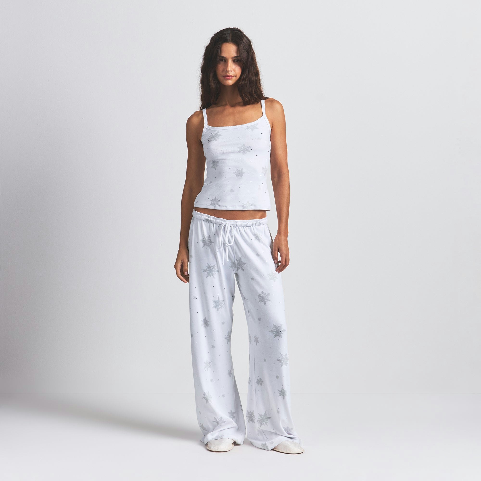 LOGO PLUSH POINTELLE RHINESTONE TANK | SNOW RHINESTONE PRINT ON A MODEL FRONT VIEW @ | FOCUS: 0.0, 1.0, 0.9