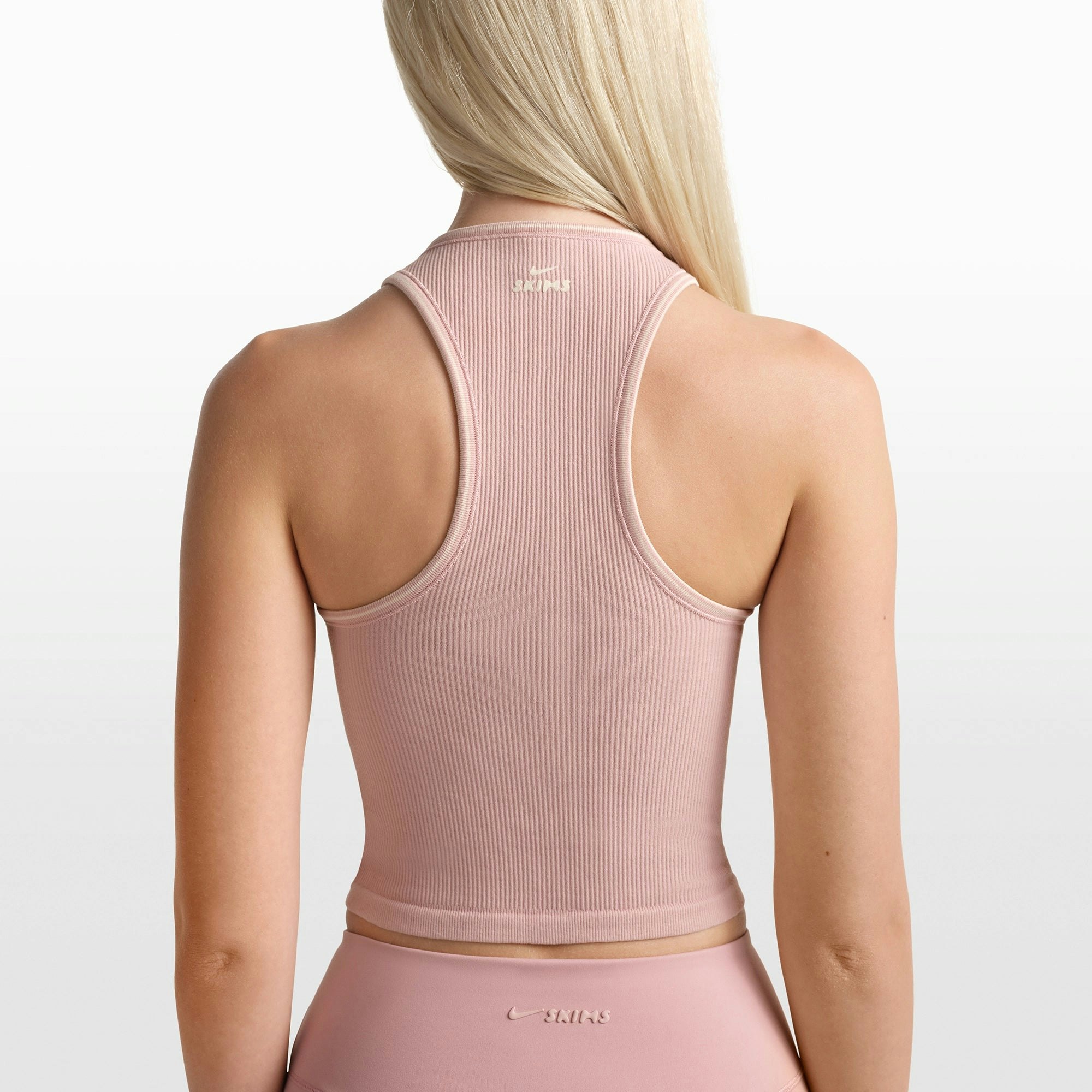 NikeSKIMS RIBBED SEAMLESS RACER FRONT TANK | HIMALAYAN/ECRU ON A MODEL FRONT VIEW @ | FOCUS: 0.0, 1.0, 0.9
