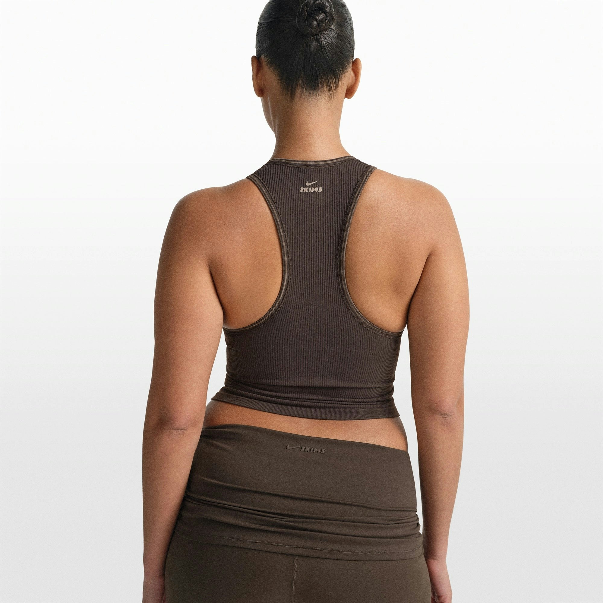 NikeSKIMS RIBBED SEAMLESS RACER FRONT TANK | PHOENIX ON A MODEL FRONT VIEW @ | FOCUS: 0.0, 1.0, 0.9