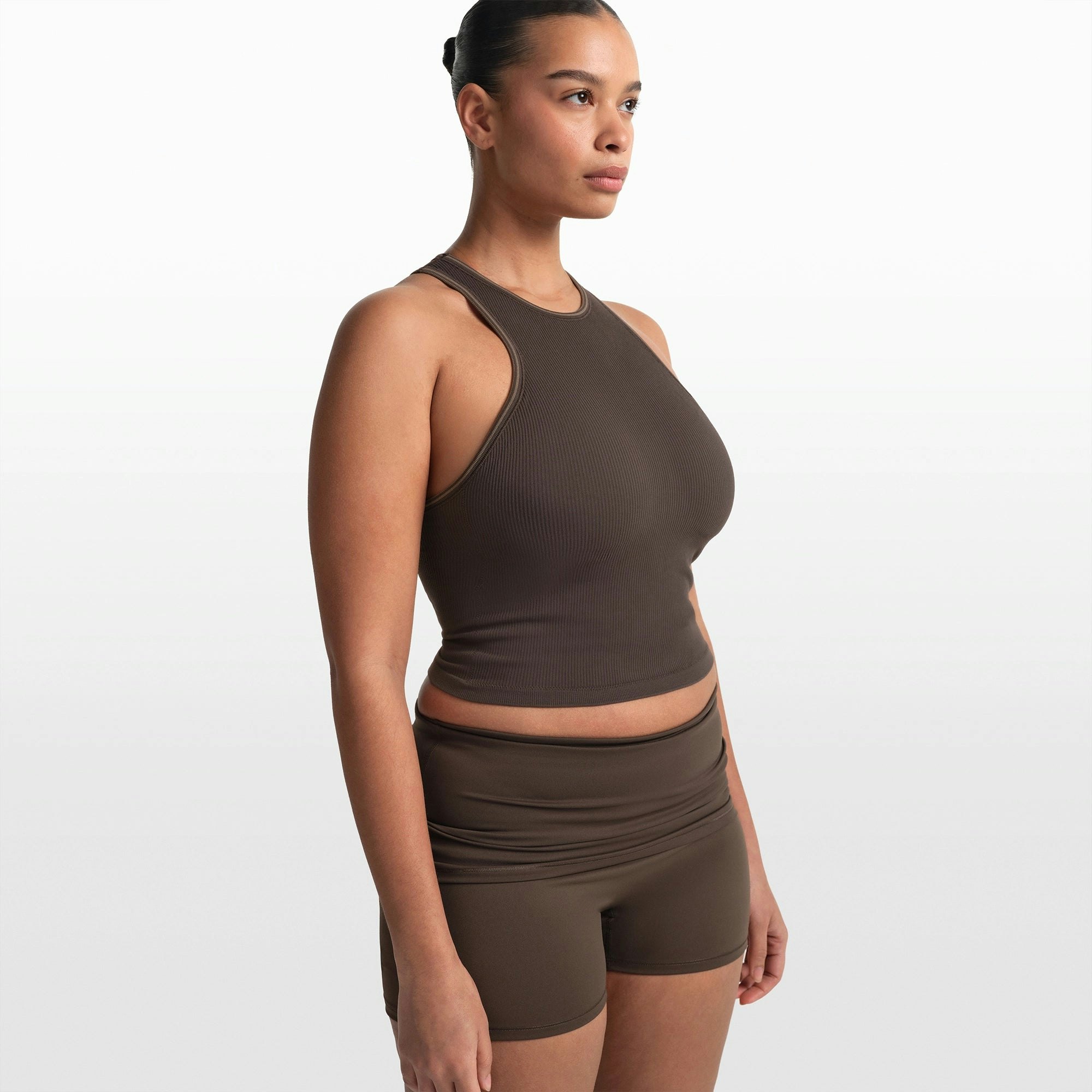 NikeSKIMS RIBBED SEAMLESS RACER FRONT TANK | PHOENIX ON A MODEL FRONT VIEW @ | FOCUS: 0.0, 1.0, 0.9