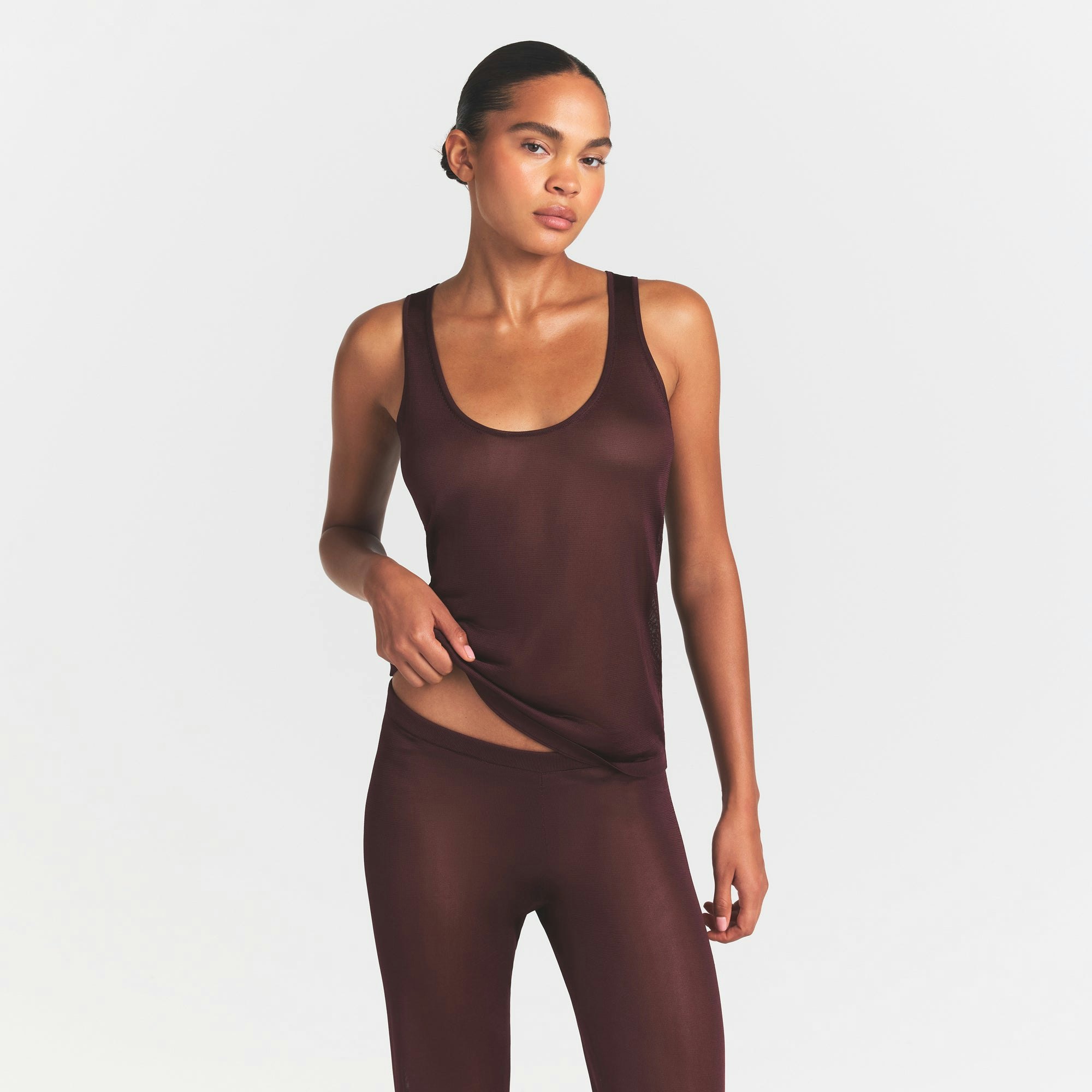 SLINKY KNIT SCOOP LONG TANK | CURRANT ON A MODEL SIDE VIEW @ | FOCUS: 0.0, 1.0, 0.9