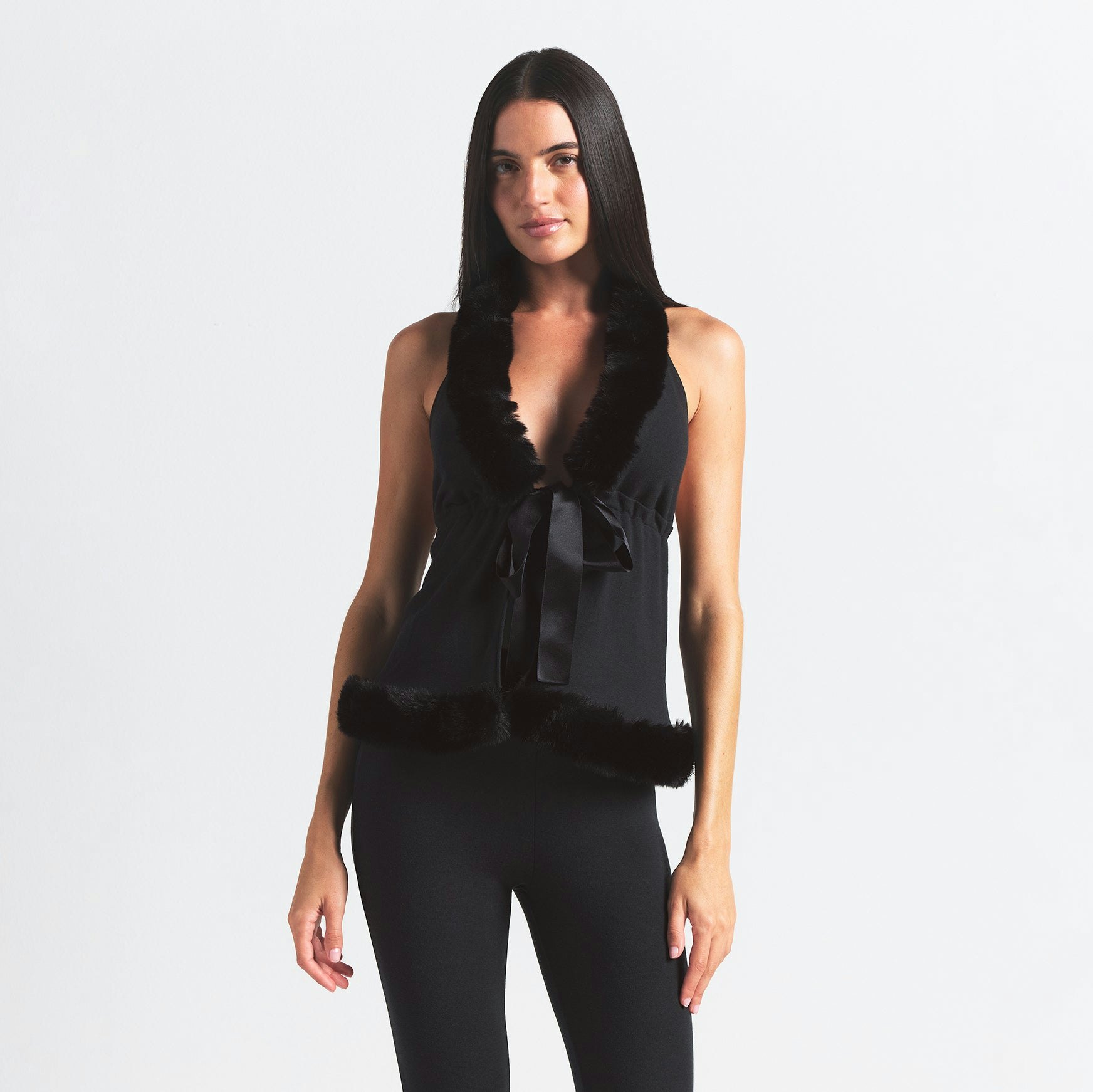 SKIMS CLOUD HALTER TOP | ONYX ON A MODEL FRONT VIEW @ | FOCUS: 0.0, 1.0, 0.9