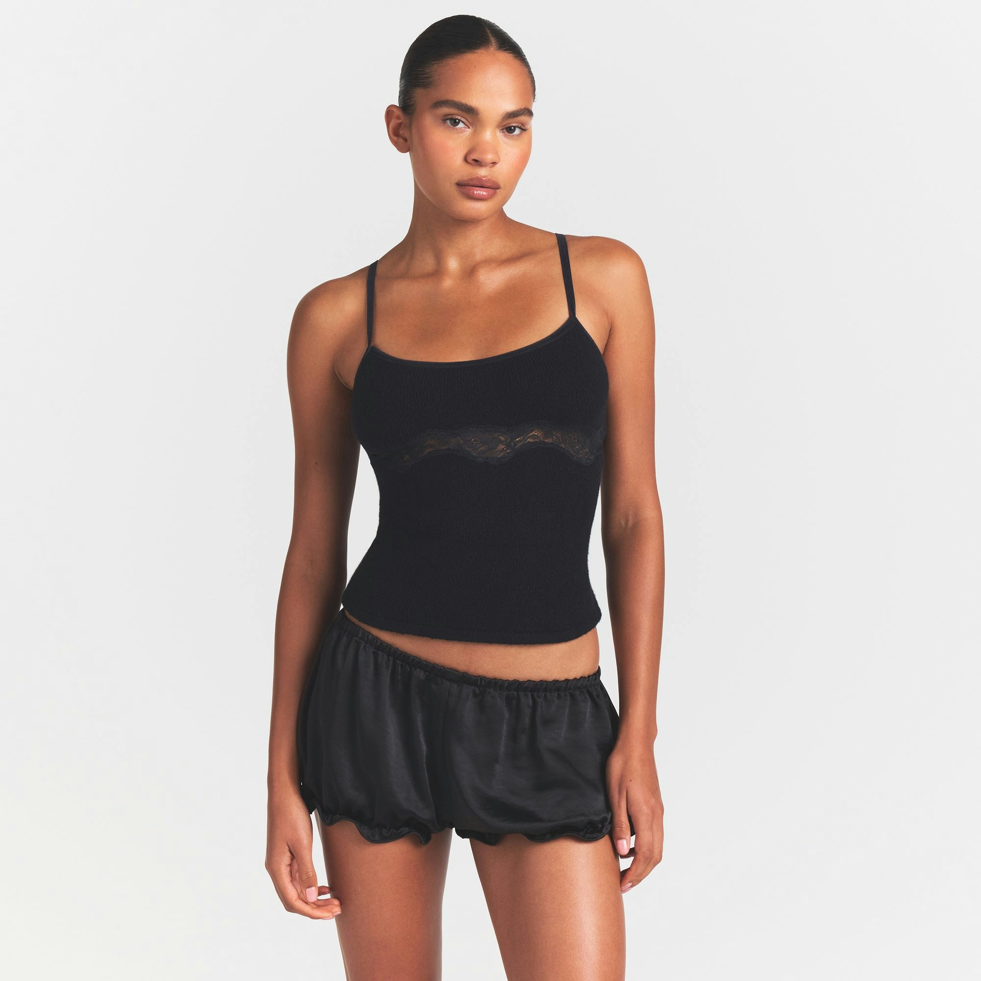 LACE KNIT TANK | OBSIDIAN ON A MODEL SIDE VIEW @ | FOCUS: 0.0, 1.0, 0.9