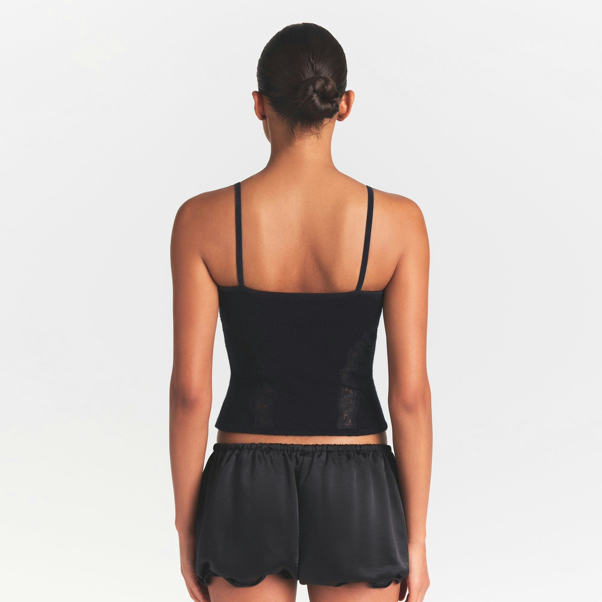 LACE KNIT TANK | OBSIDIAN ON A MODEL SIDE VIEW @ | FOCUS: 0.0, 1.0, 0.9