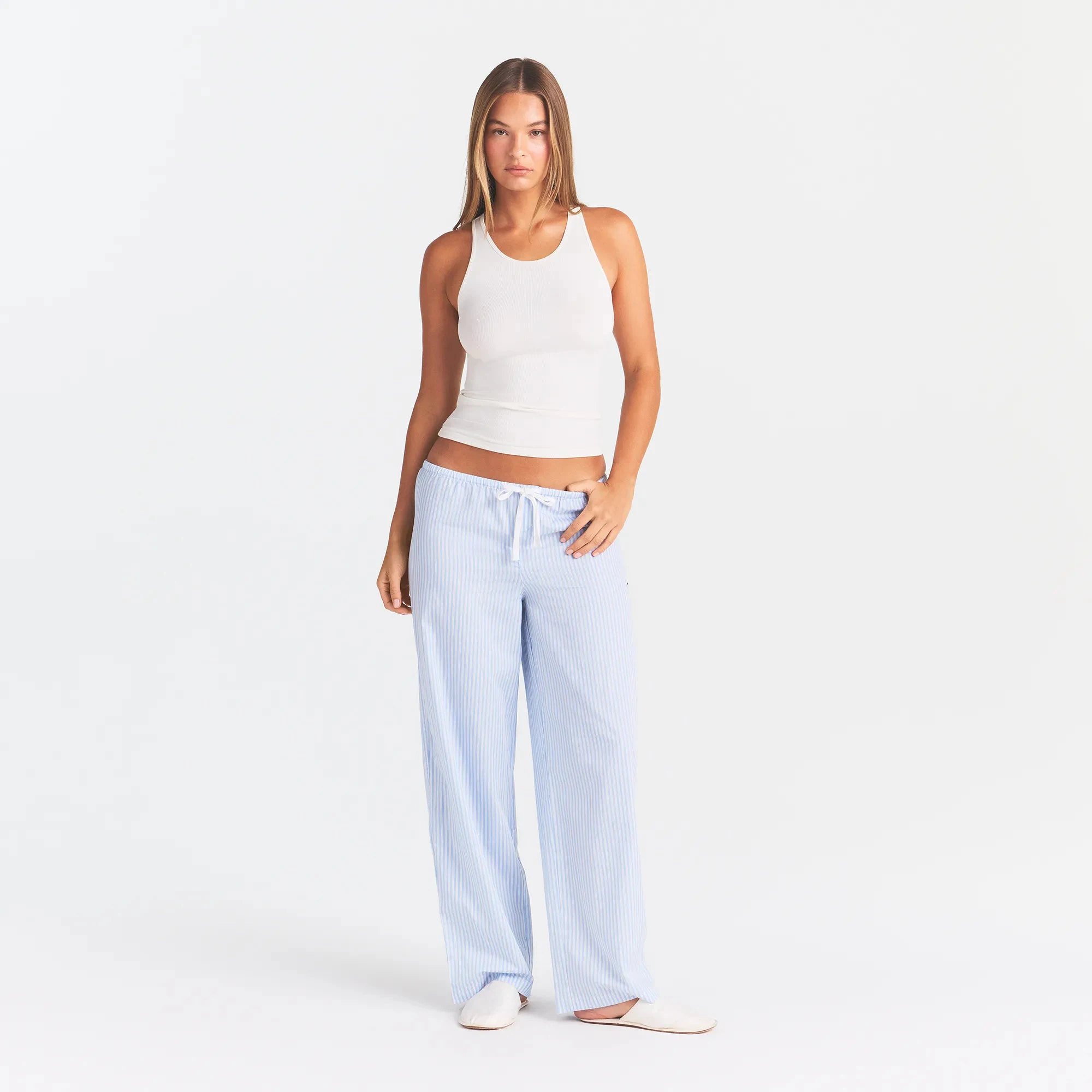 RIB SLEEP TANK | IVORY & LAYS FLAT ON A WHITE BACKGROUND | FLT