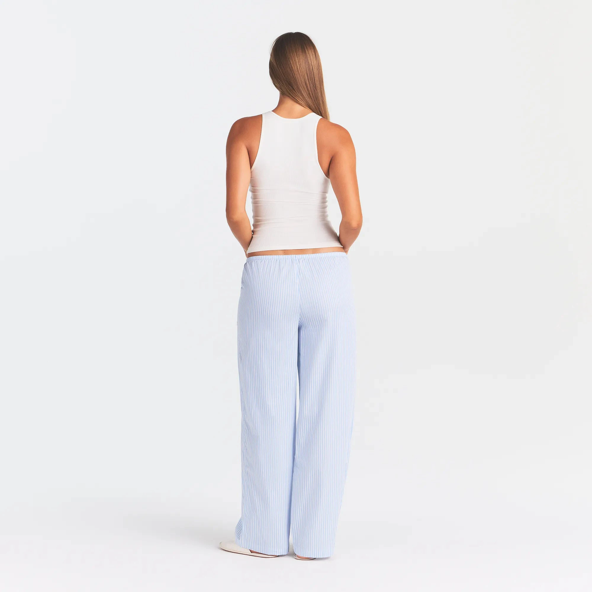 RIB SLEEP TANK | IVORY & LAYS FLAT ON A WHITE BACKGROUND | FLT