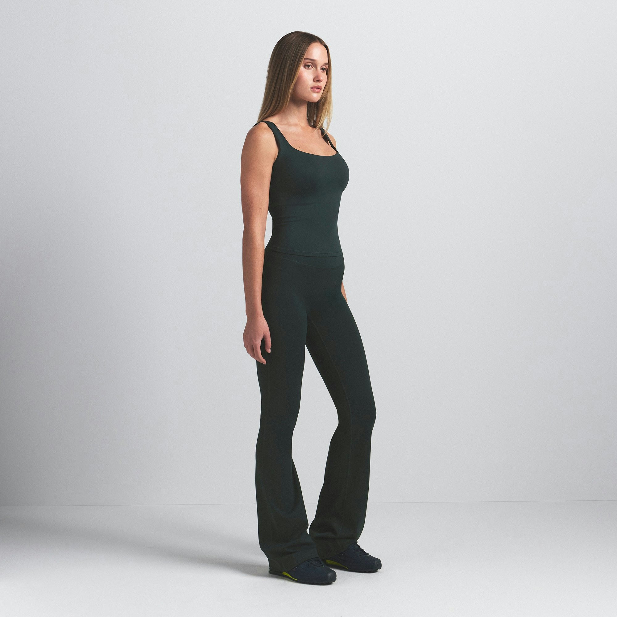 NikeSKIMS MATTE SQUARE NECK TANK | DARK TEAL ON A MODEL SIDE VIEW @ | FOCUS: 0.0, 1.0, 0.9