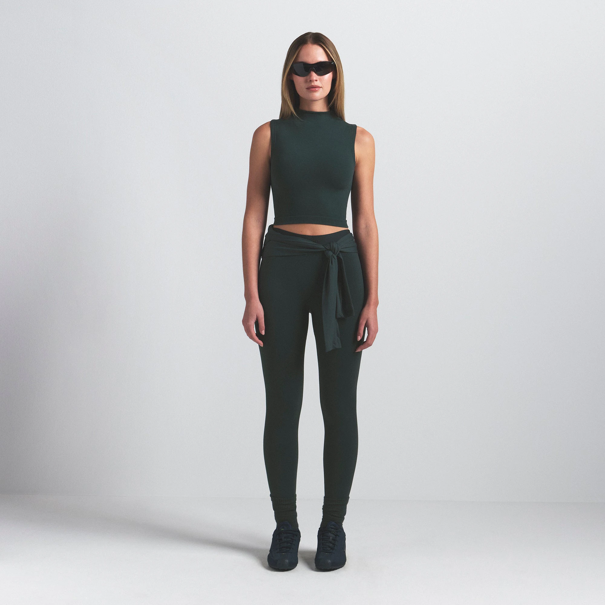 NikeSKIMS VINTAGE SEAMLESS MOCK NECK BRA TOP | DARK TEAL ON A MODEL FRONT VIEW @ | FOCUS: 0.0, 1.0, 0.9