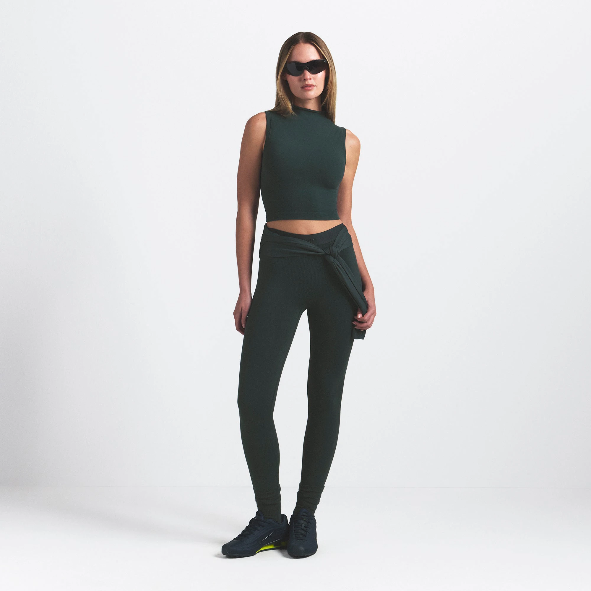 NikeSKIMS VINTAGE SEAMLESS MOCK NECK BRA TOP | DARK TEAL ON A MODEL FRONT VIEW @ | FOCUS: 0.0, 1.0, 0.9