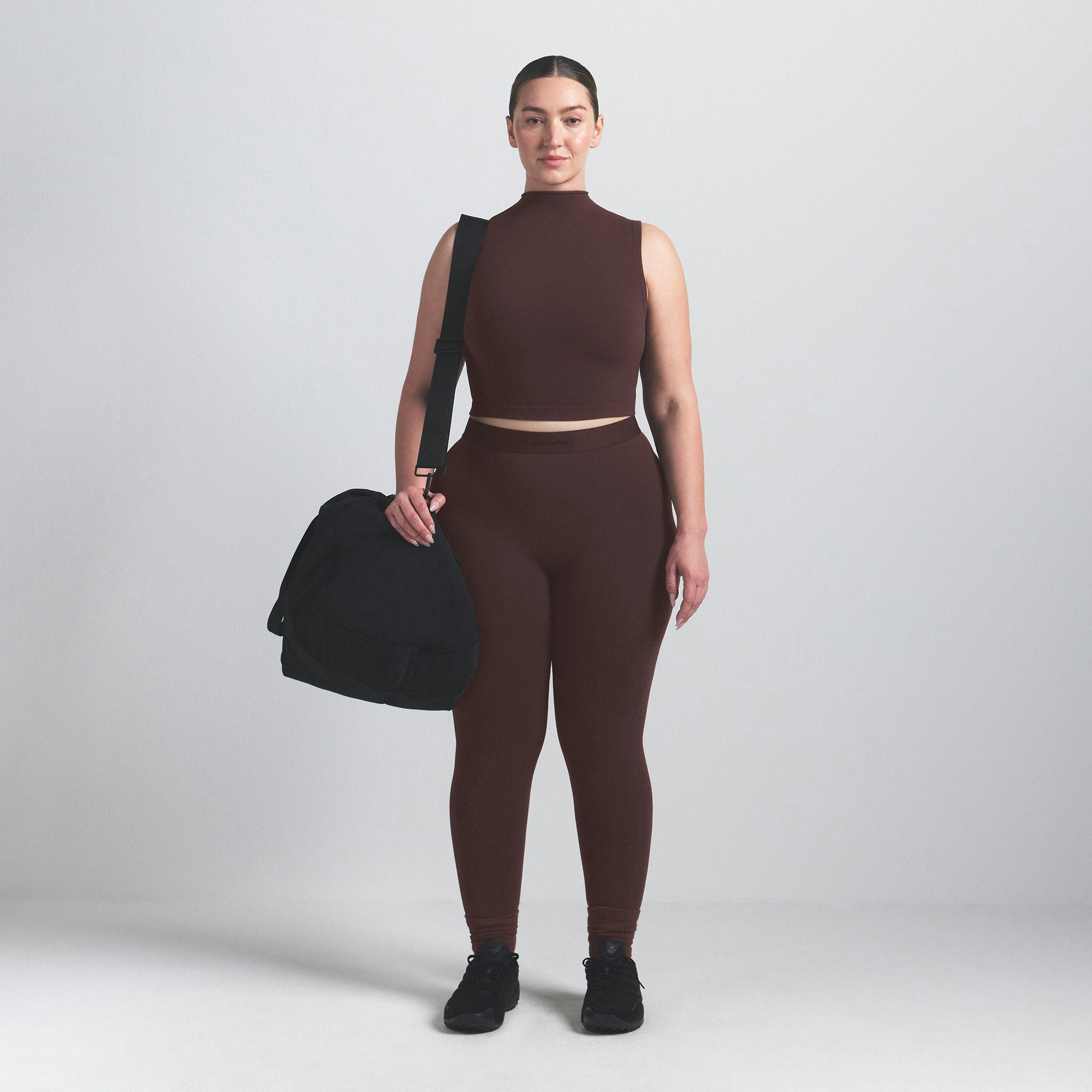 NikeSKIMS VINTAGE SEAMLESS MOCK NECK BRA TOP | PHOENIX ON A MODEL FRONT VIEW