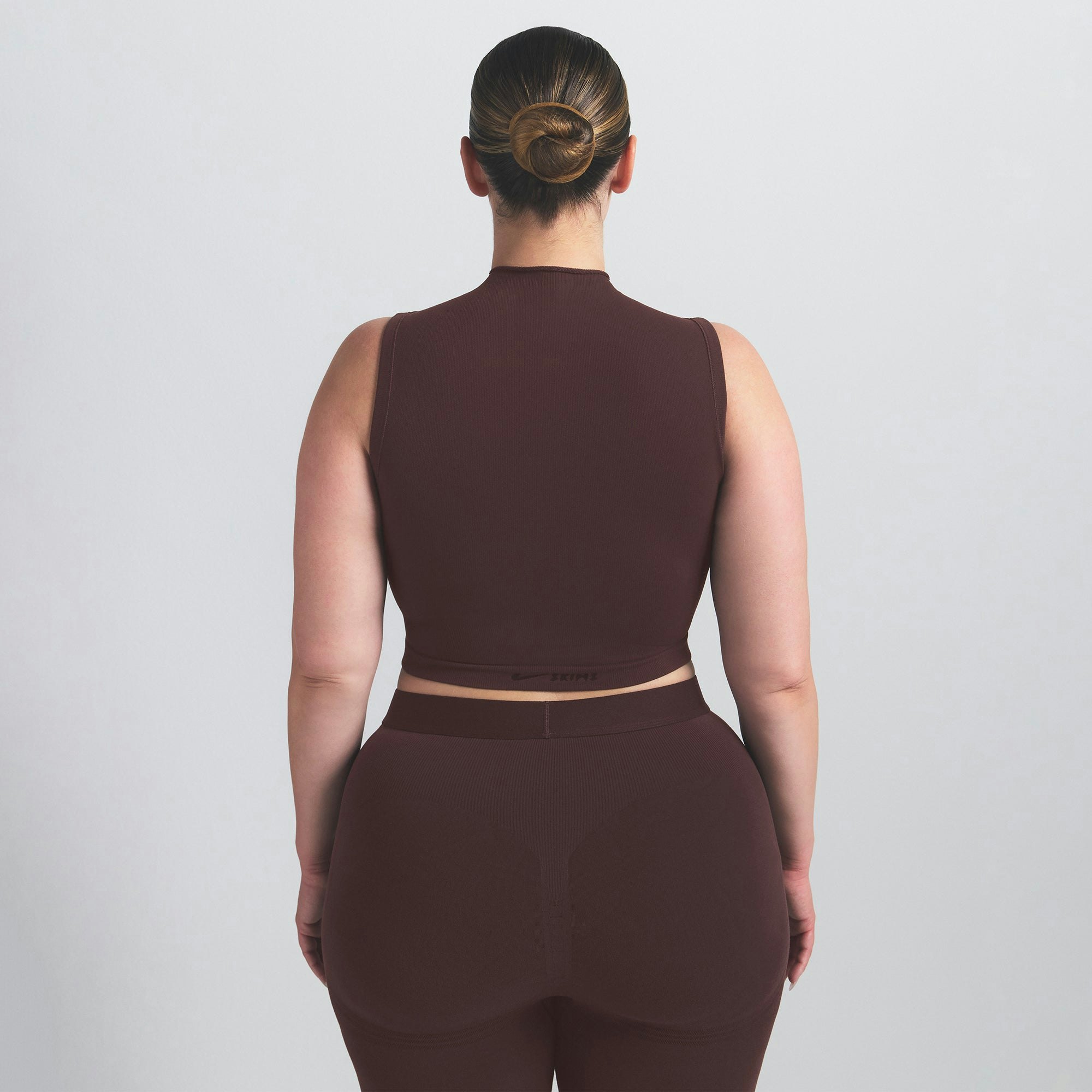 NikeSKIMS VINTAGE SEAMLESS MOCK NECK BRA TOP | PHOENIX ON A MODEL SIDE VIEW