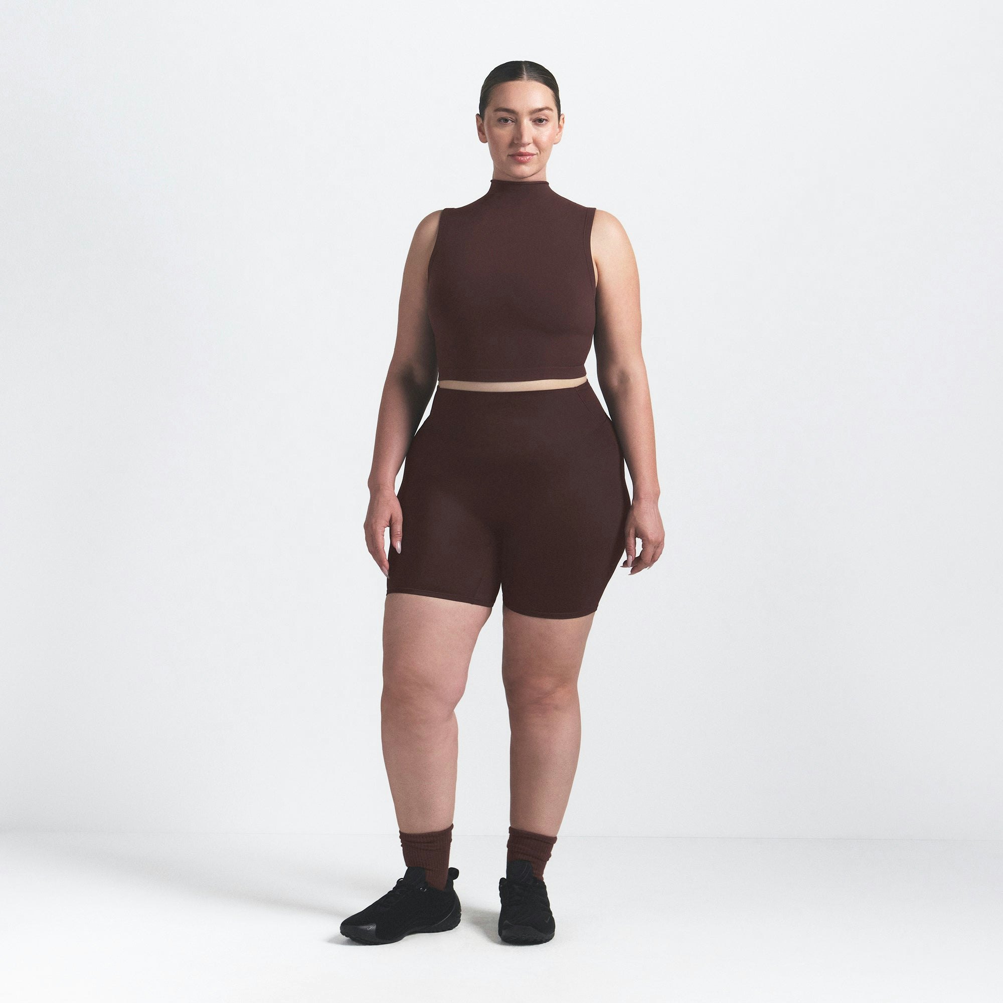 NikeSKIMS VINTAGE SEAMLESS MOCK NECK BRA TOP | PHOENIX ON A MODEL FRONT VIEW @ | FOCUS: 0.9, 0.1, 0.7