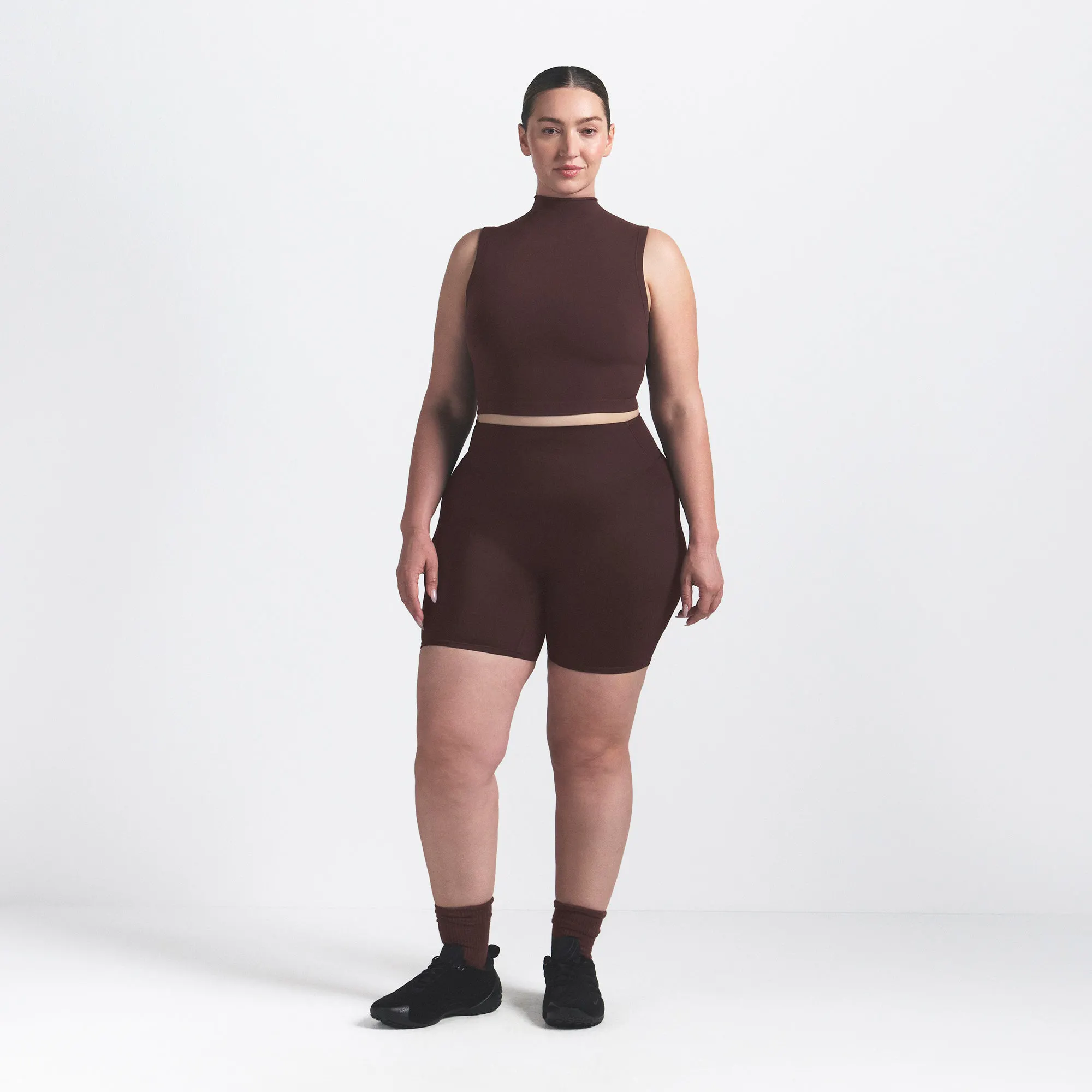 NikeSKIMS VINTAGE SEAMLESS MOCK NECK BRA TOP | PHOENIX ON A MODEL FRONT VIEW @ | FOCUS: 0.9, 0.1, 0.7