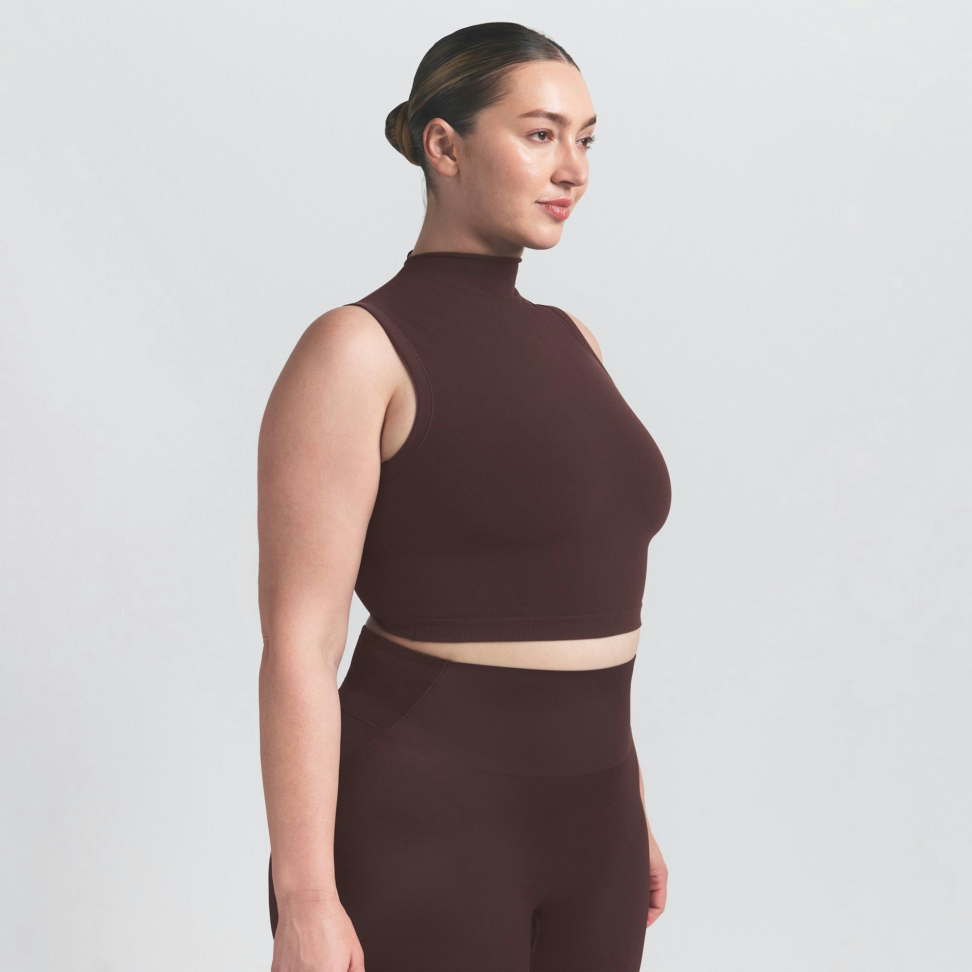 NikeSKIMS VINTAGE SEAMLESS MOCK NECK BRA TOP | PHOENIX ON A MODEL SIDE VIEW