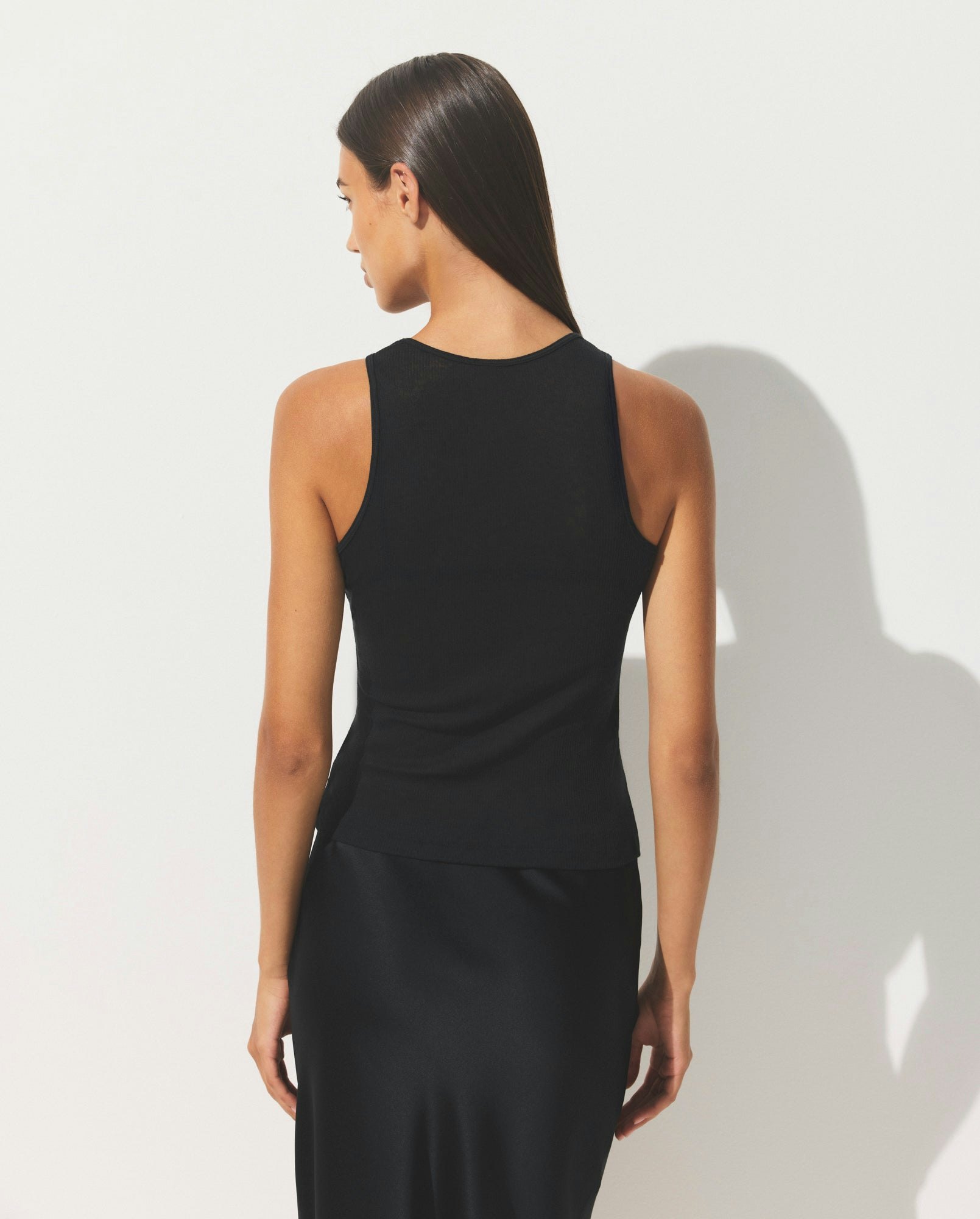 SHEER COTTON RIB CREW NECK TANK | SOOT ON A MODEL SIDE VIEW | FOCUS: 0.0, 1.0, 0.9