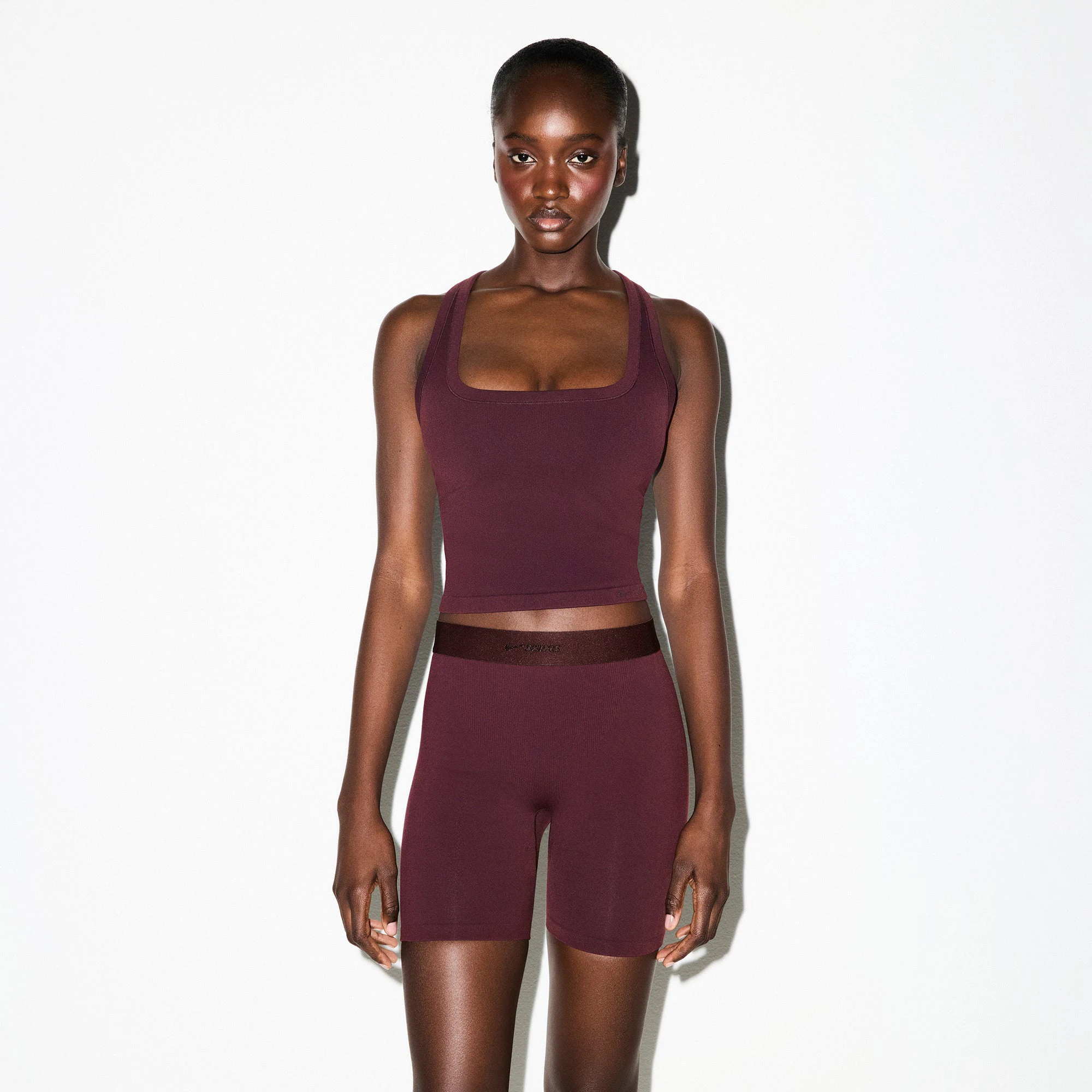 NikeSKIMS VINTAGE SEAMLESS RACER BACK TANK | CURRANT ON A MODEL FRONT VIEW @ | FOCUS: 0.0, 1.0, 0.9
