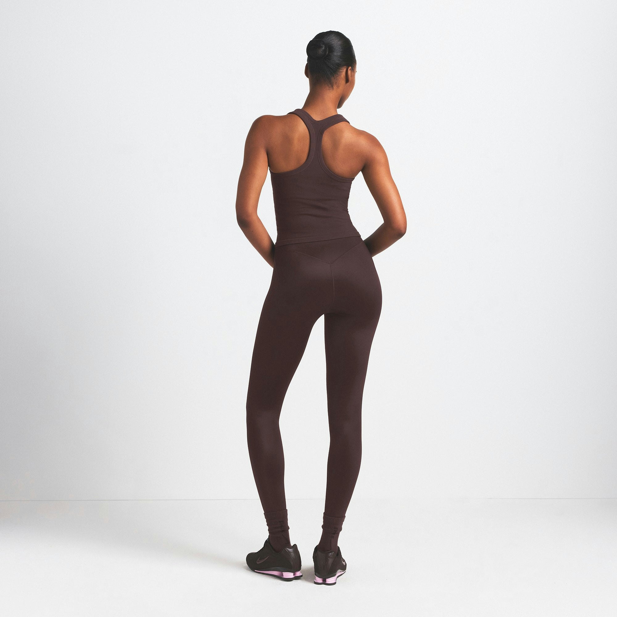 NikeSKIMS VINTAGE SEAMLESS RACER BACK TANK | PHOENIX ON A MODEL SIDE VIEW @ | FOCUS: 0.9, 0.1, 0.