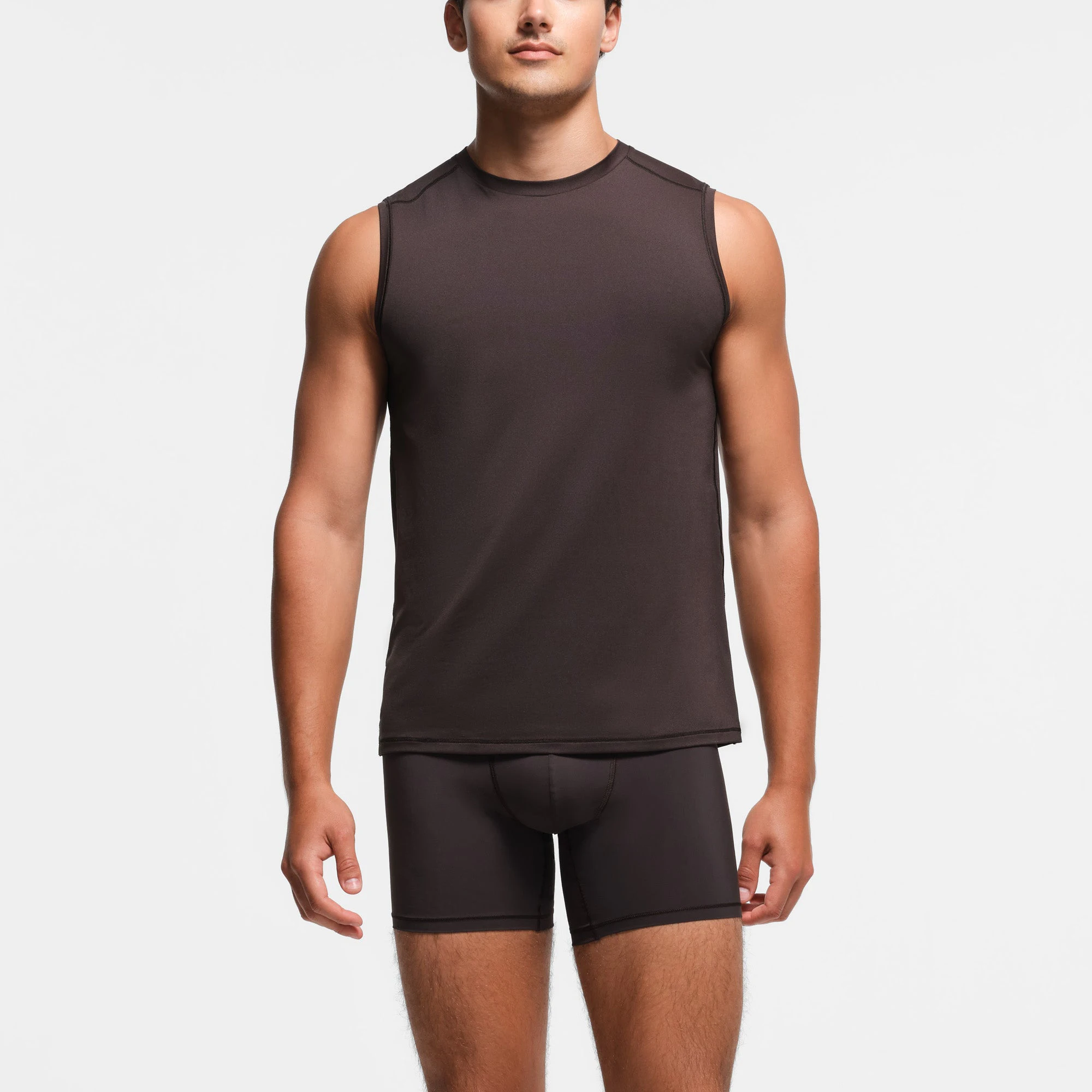 SKIMS SPORT MENS MUSCLE TANK | PHOENIX ON A MODEL FRONT VIEW