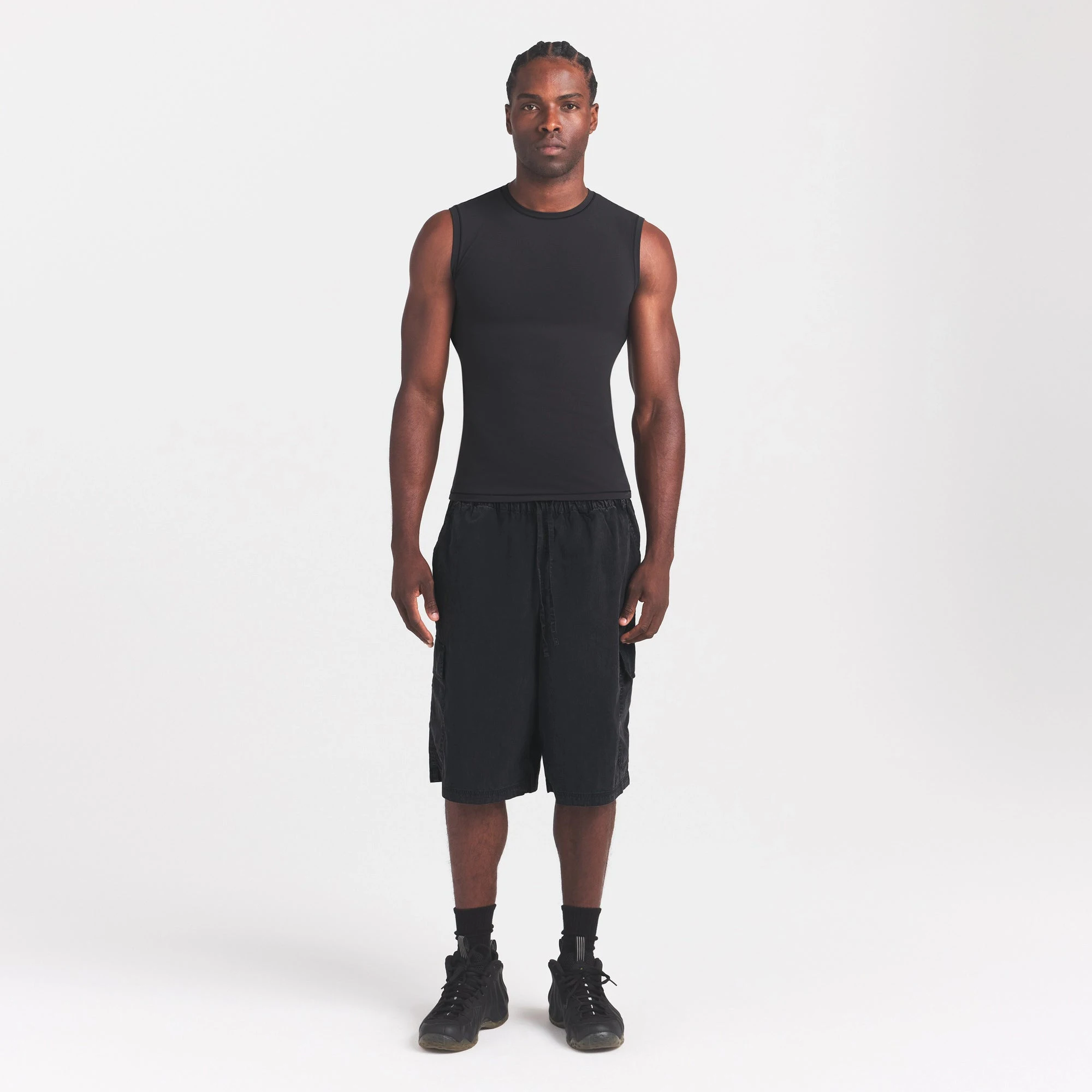 FITS EVERYBODY MENS SLIM TANK | ONYX ON A MODEL FRONT VIEW