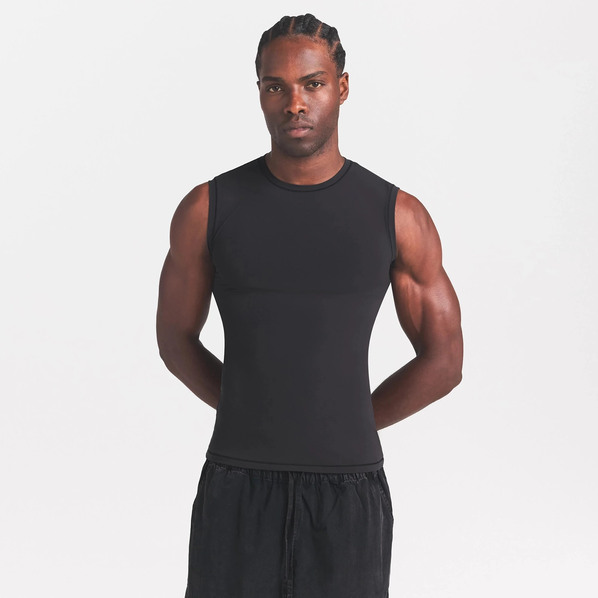 FITS EVERYBODY MENS SLIM TANK | ONYX ON A MODEL SIDE VIEW