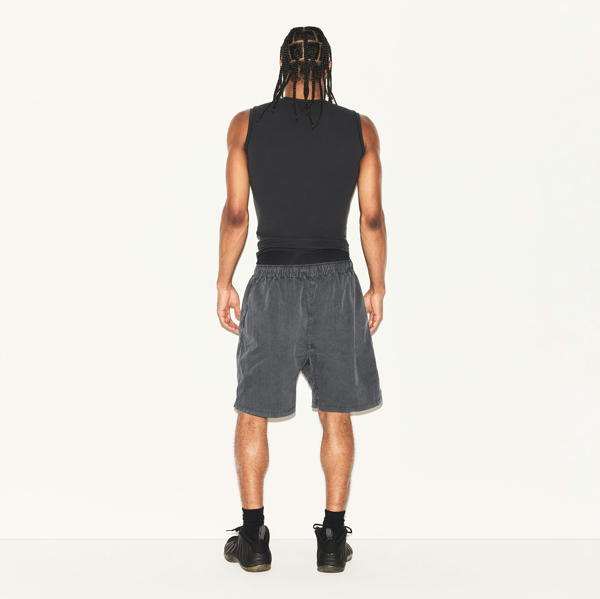 FITS EVERYBODY MENS SLIM TANK | ONYX ON A MODEL BACK VIEW | FOCUS: 0.0, 1.0, 0.9
