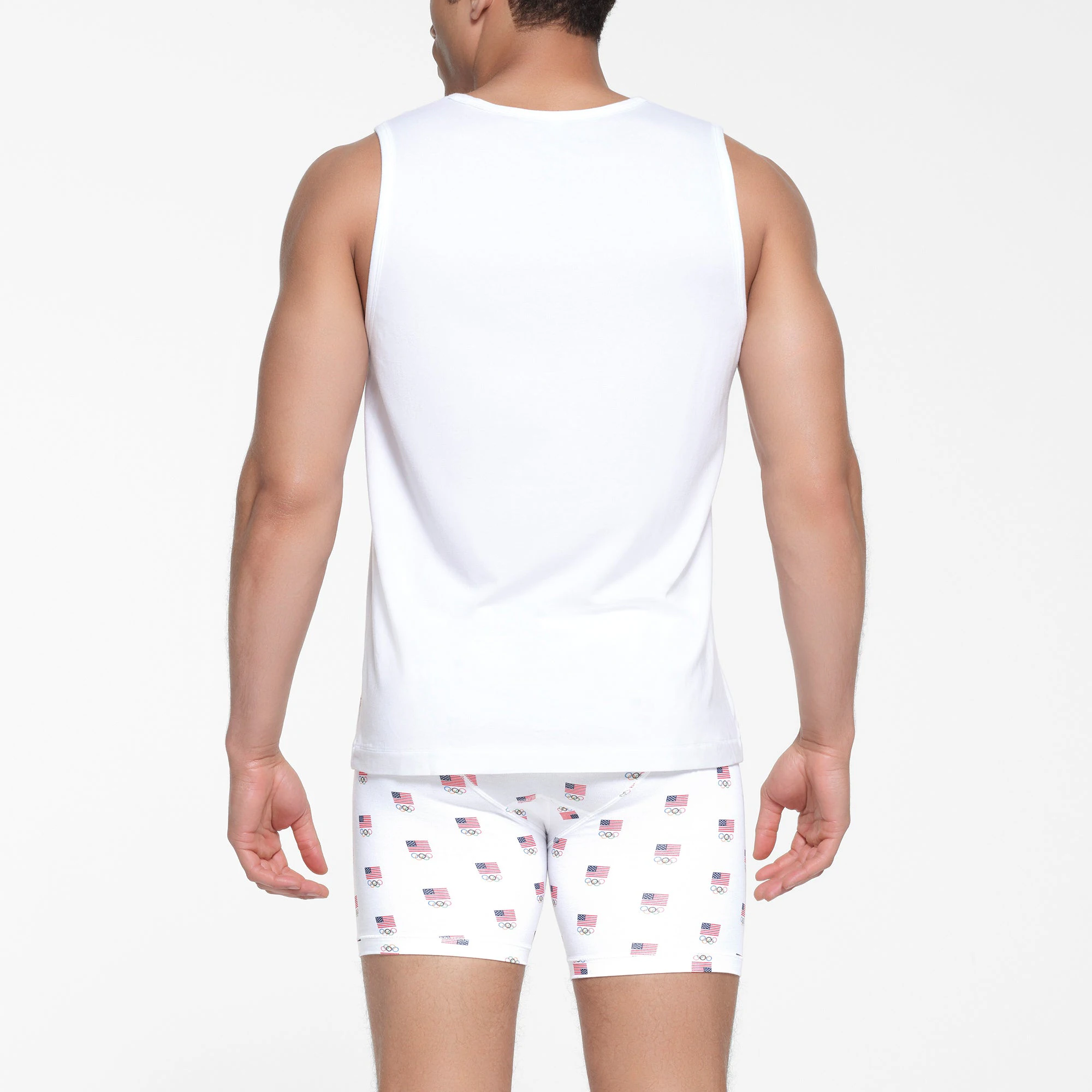 SKIMS FOR TEAM USA SKIMS COTTON MENS OLYMPIC TANK | WHITE ON A MODEL BACK VIEW