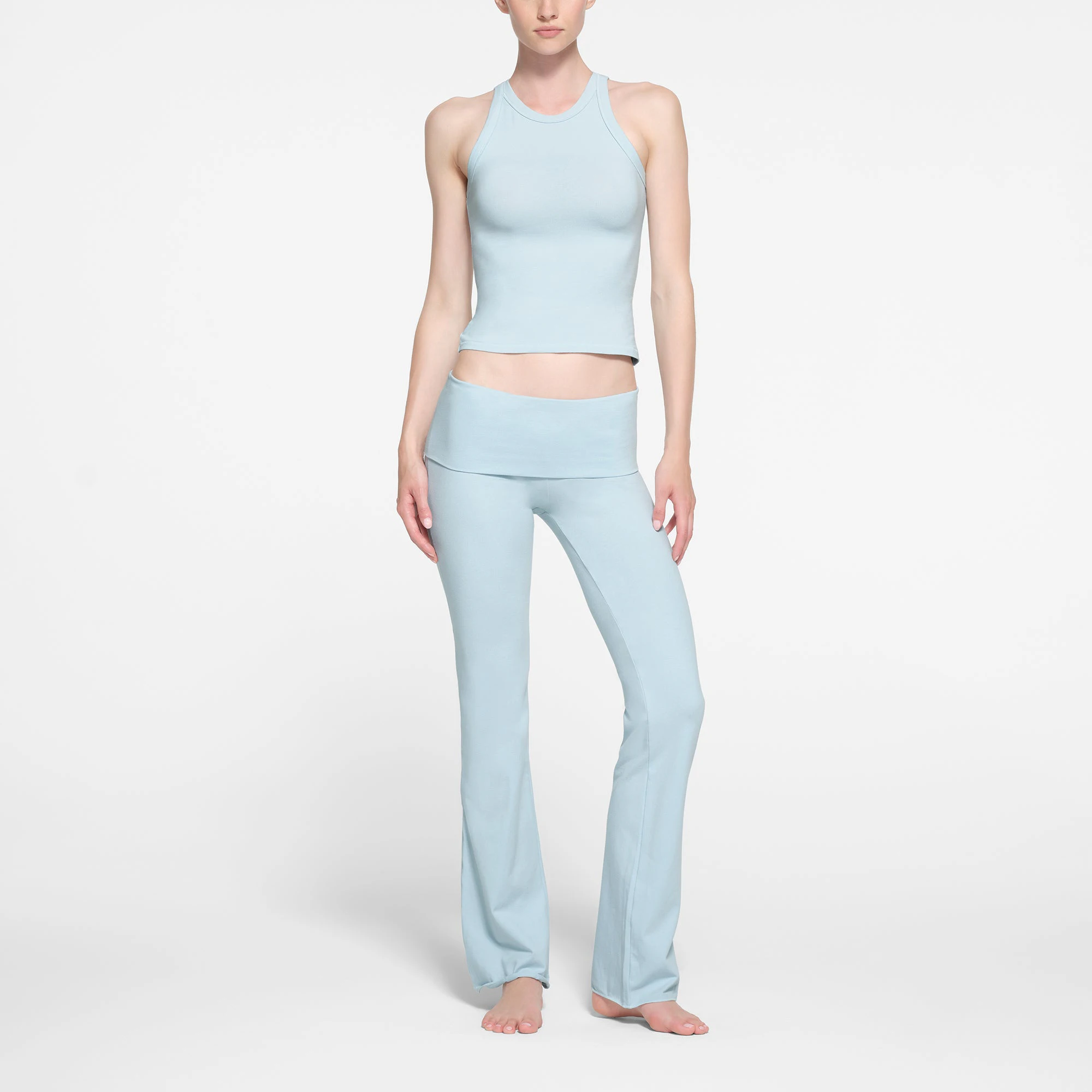 COTTON JERSEY HIGH NECK TANK | OPAL ON A MODEL FRONT VIEW