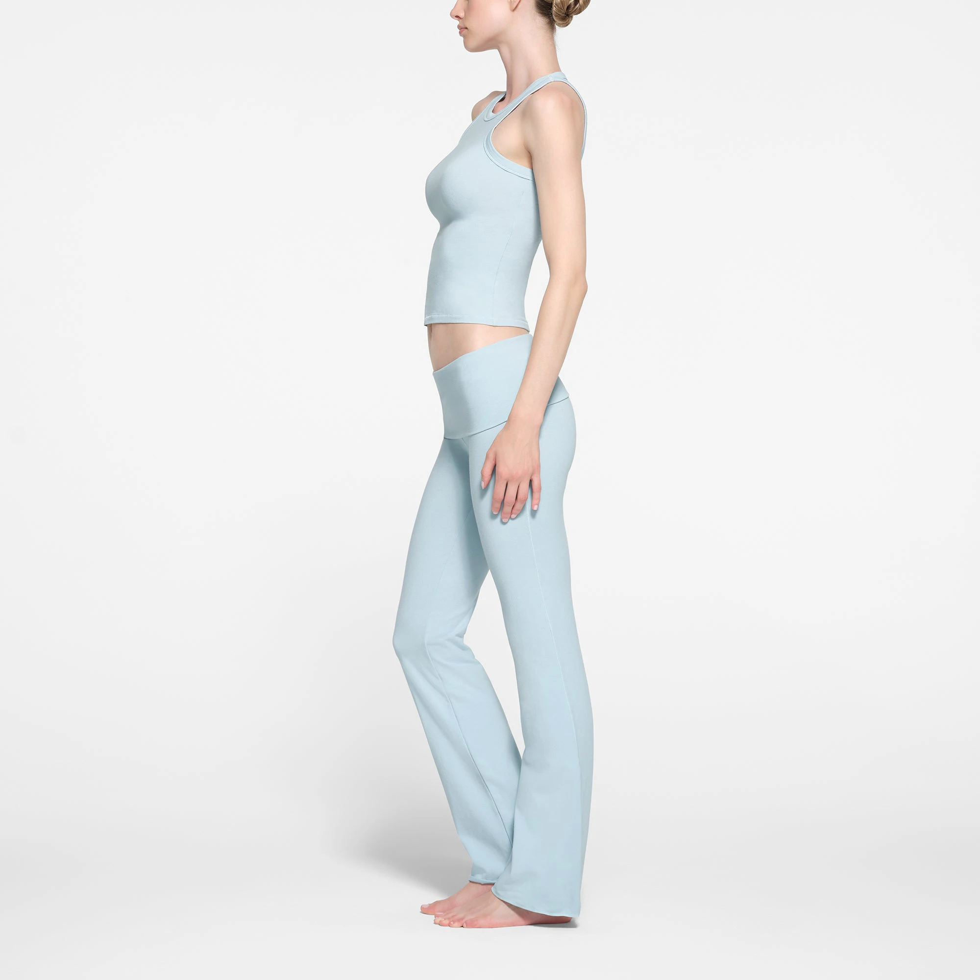 COTTON JERSEY HIGH NECK TANK | OPAL ON A MODEL SIDE VIEW