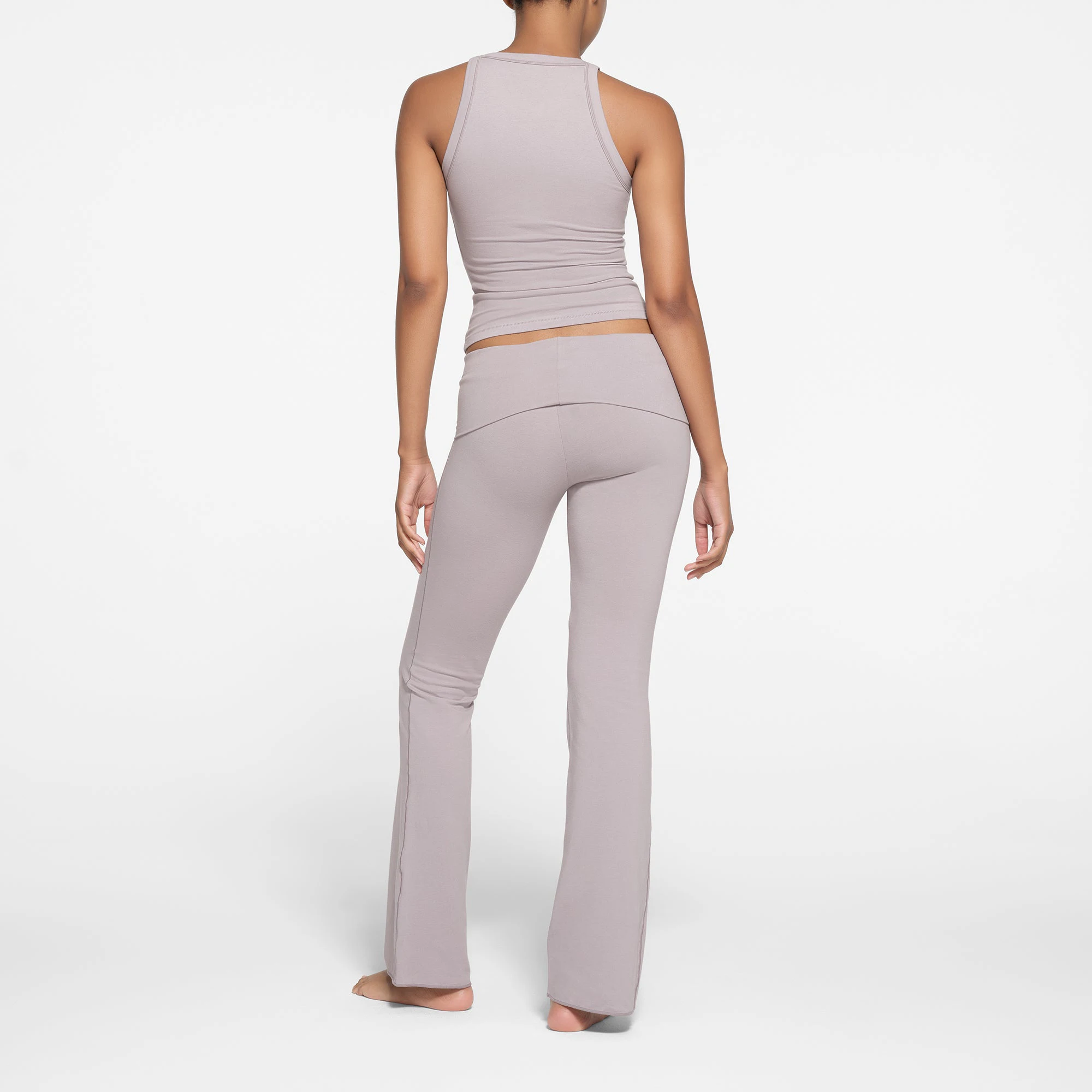 COTTON JERSEY HIGH NECK TANK | OYSTER ON A MODEL BACK VIEW