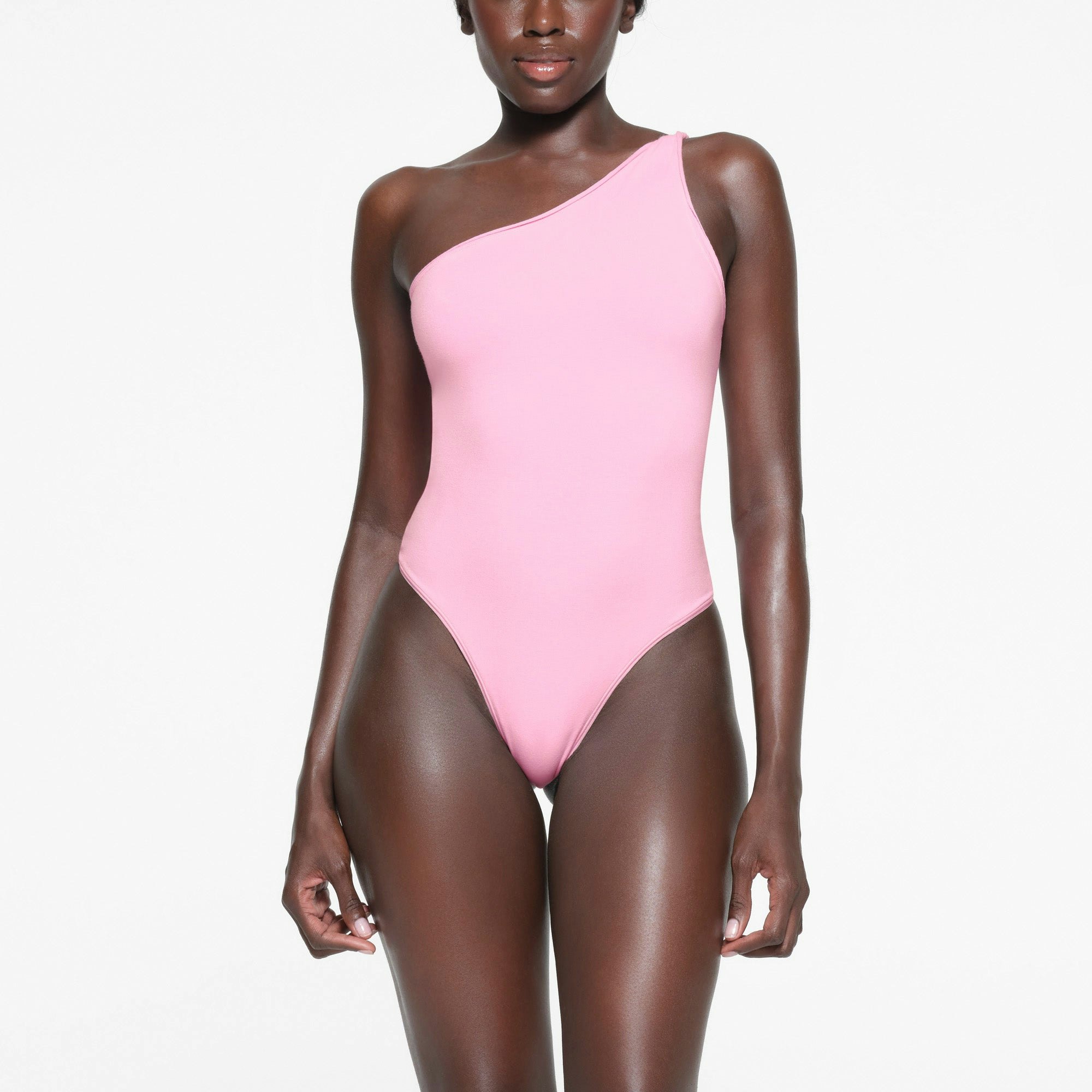 COTTON TWIST ONE SHOULDER BODYSUIT | COTTON CANDY ON A MODEL FRONT VIEW
