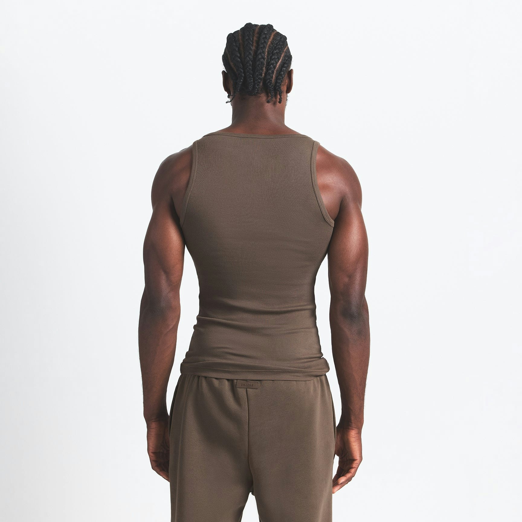 SKIMS Cotton MENS RIB TANK 3-PACK | DRIFTWOOD MULTI ON A MODEL BACK VIEW @ | FOCUS: 0.0, 1.0, 0.9