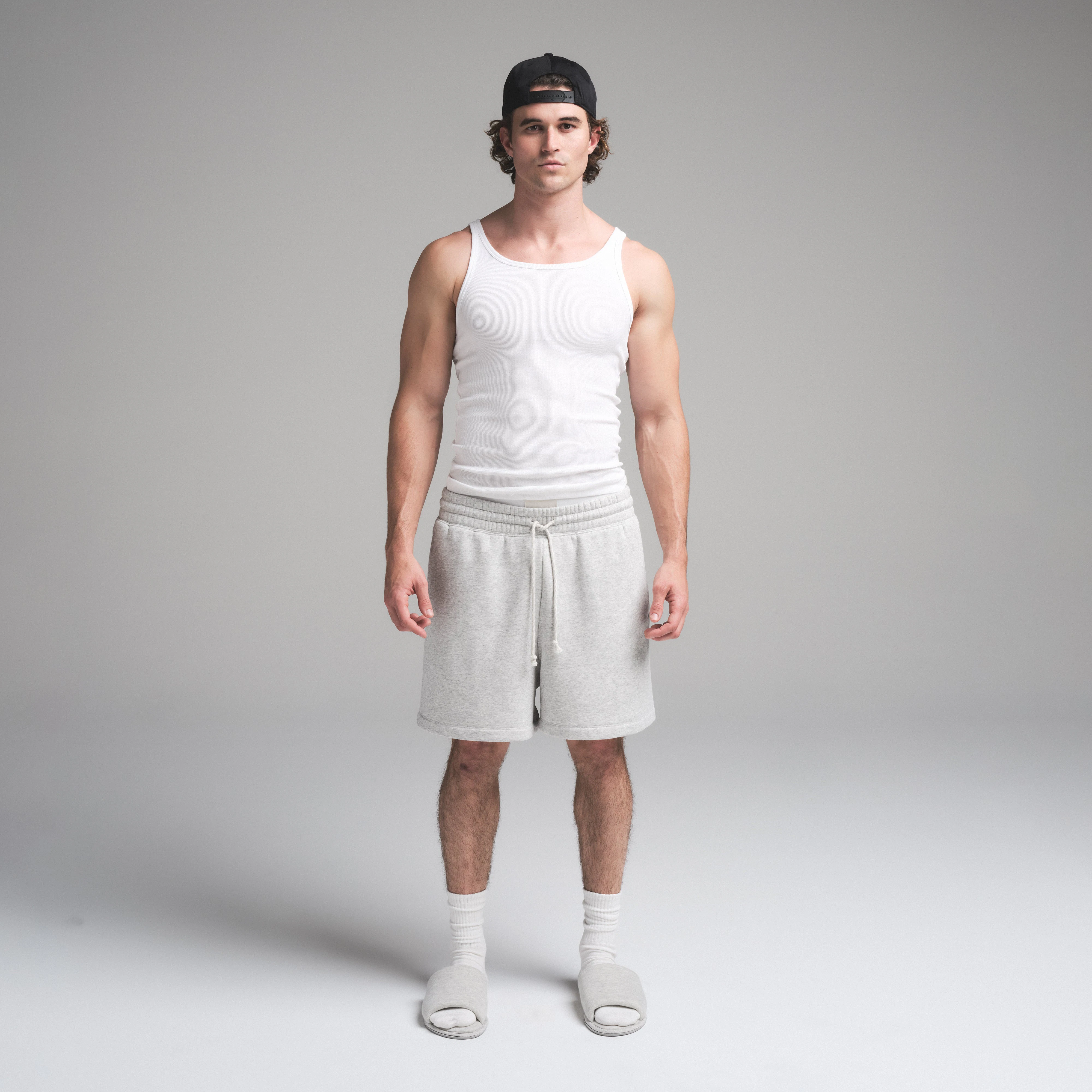 SKIMS COTTON MENS RIB TANK 3-PACK | CHALK ON A MODEL FRONT VIEW | FOCUS: 0.0, 1.0, 0.9