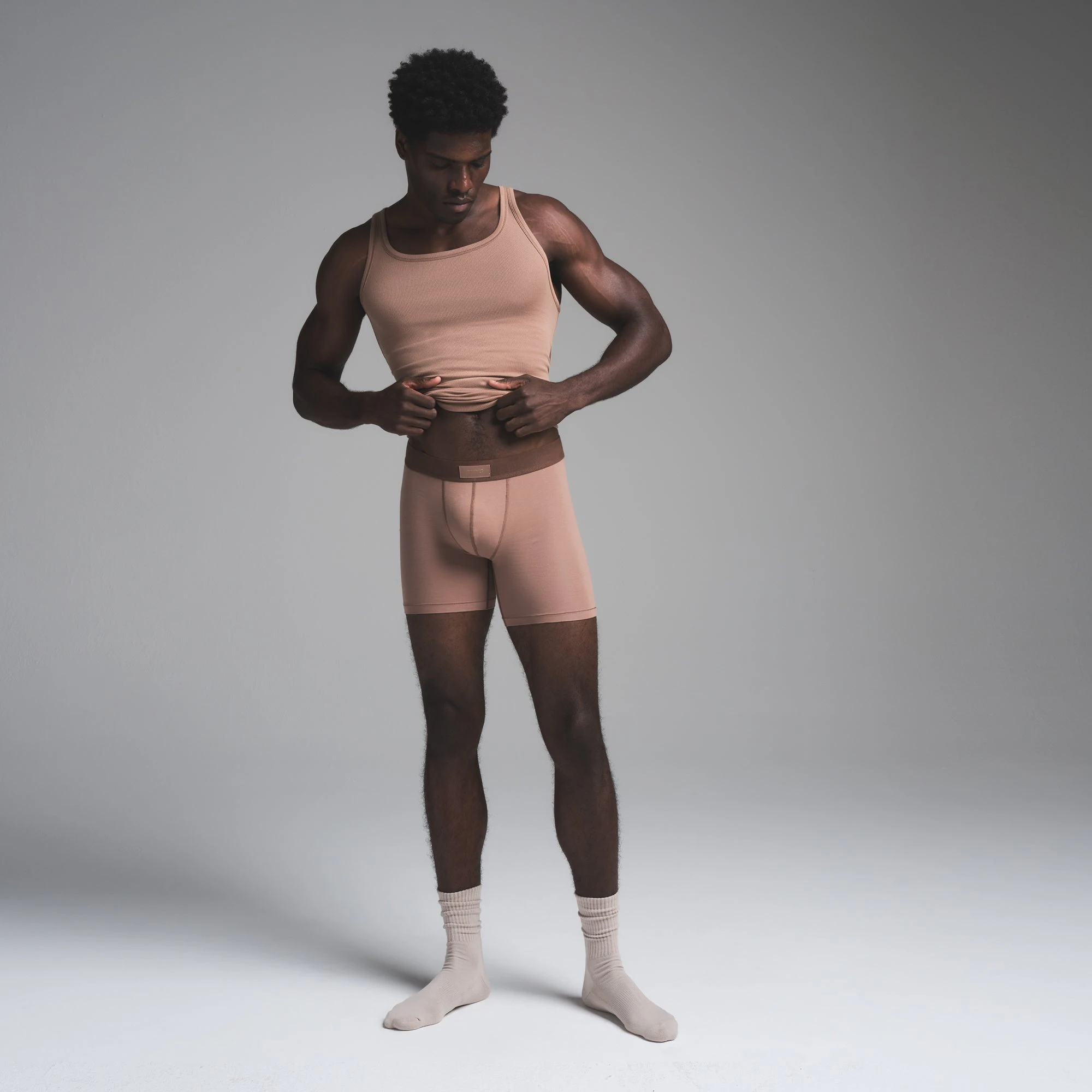 SKIMS COTTON MENS RIB TANK 3-PACK | DEEP SEA MULTI ON A MODEL FRONT VIEW | FOCUS: 0.0, 1.0, 0.9