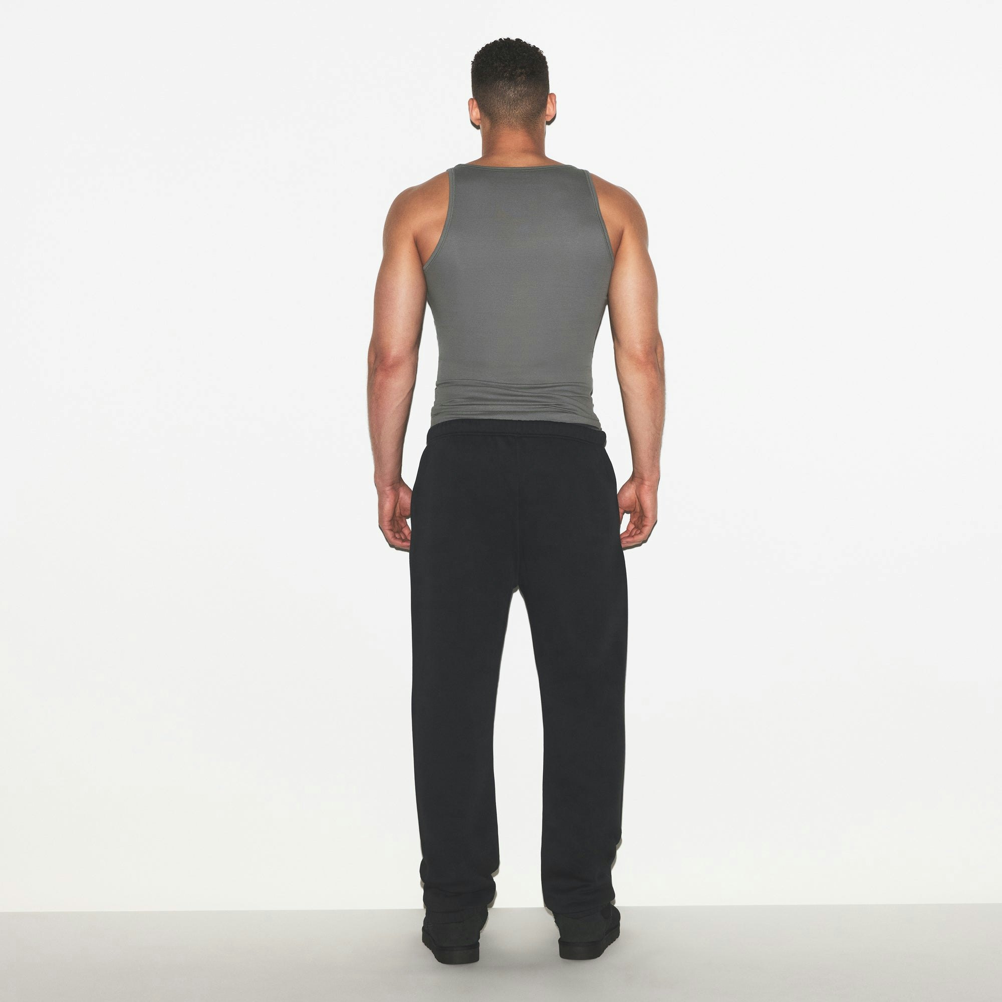 SKIMS COTTON MENS RIB TANK 3-PACK | ECRU RUSSET MULTI ON A MODEL FRONT VIEW | FOCUS: 0.0, 1.0, 0.9