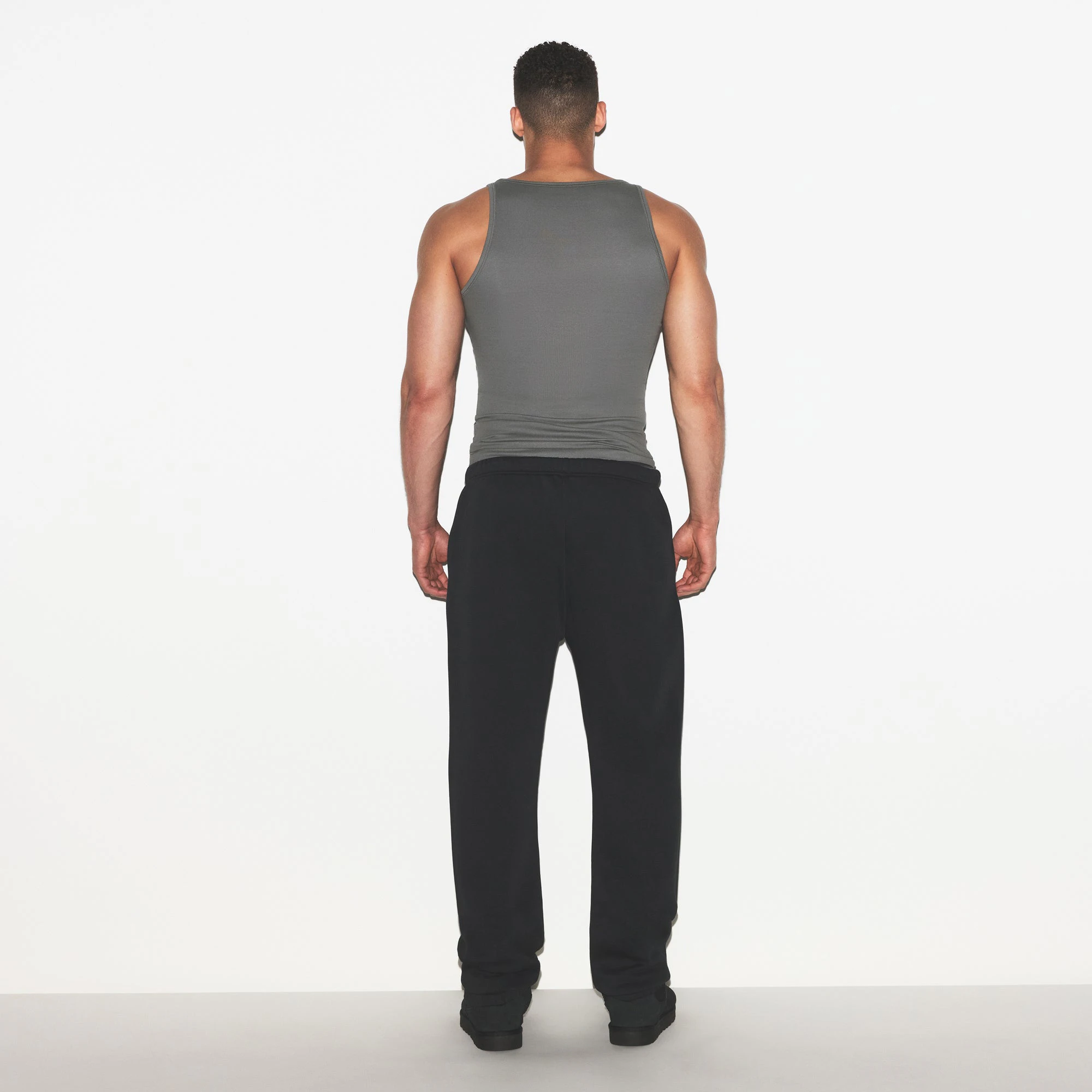 SKIMS COTTON MENS RIB TANK 3-PACK | ECRU RUSSET MULTI ON A MODEL FRONT VIEW | FOCUS: 0.0, 1.0, 0.9