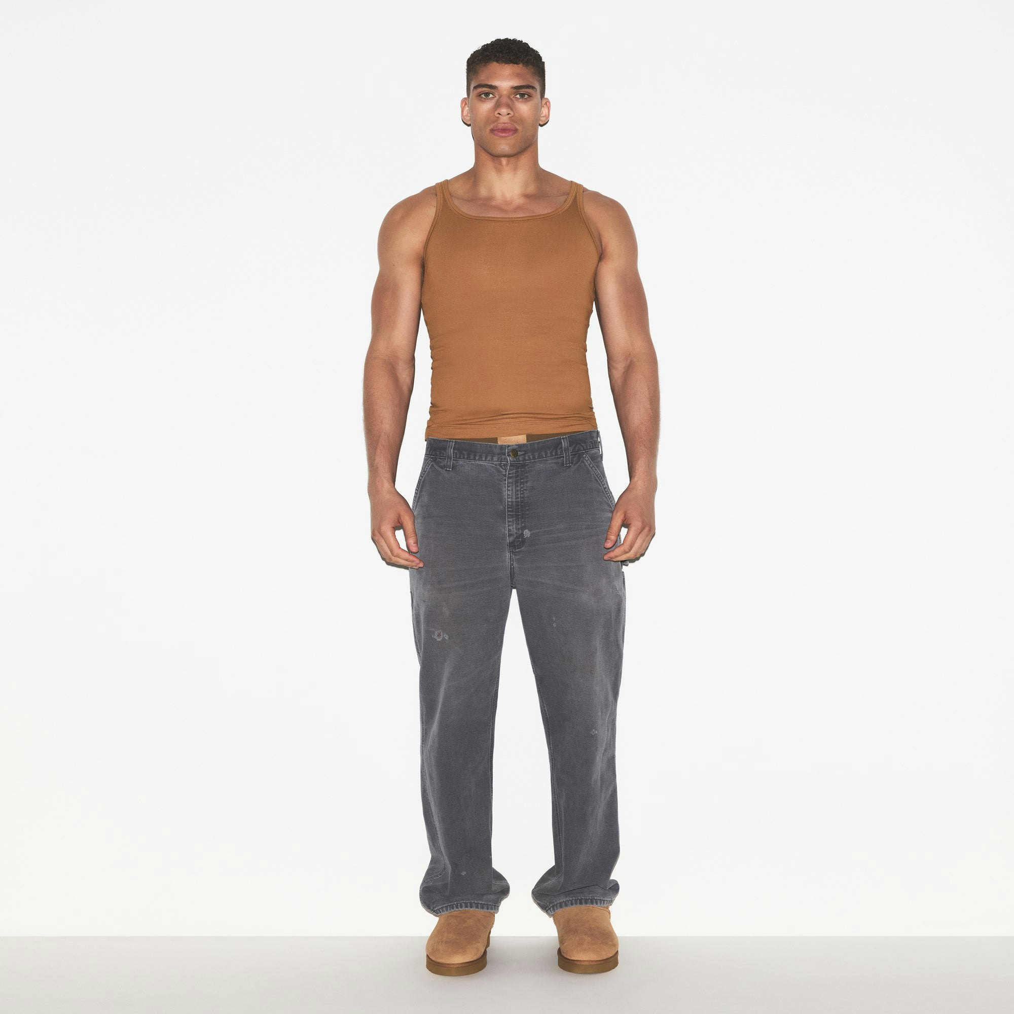 SKIMS COTTON MENS RIB TANK 3-PACK | ECRU RUSSET MULTI ON A MODEL FRONT VIEW | FOCUS: 0.0, 1.0, 0.9