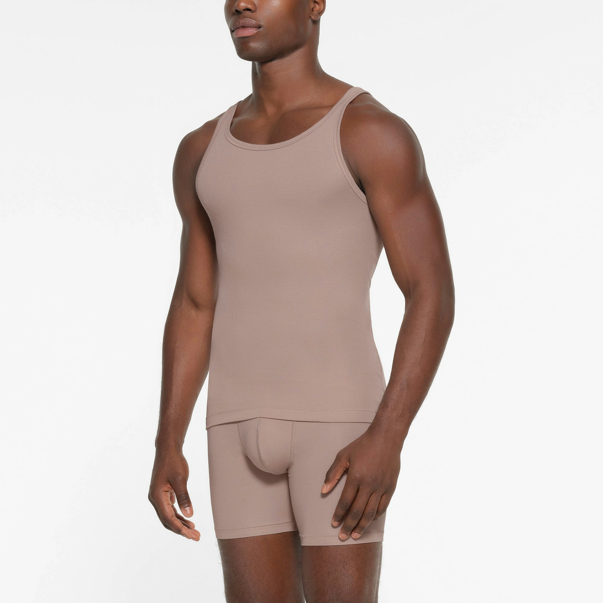 SKIMS COTTON MENS RIB TANK 3-PACK | FAWN MULTI ON A MODEL FRONT VIEW