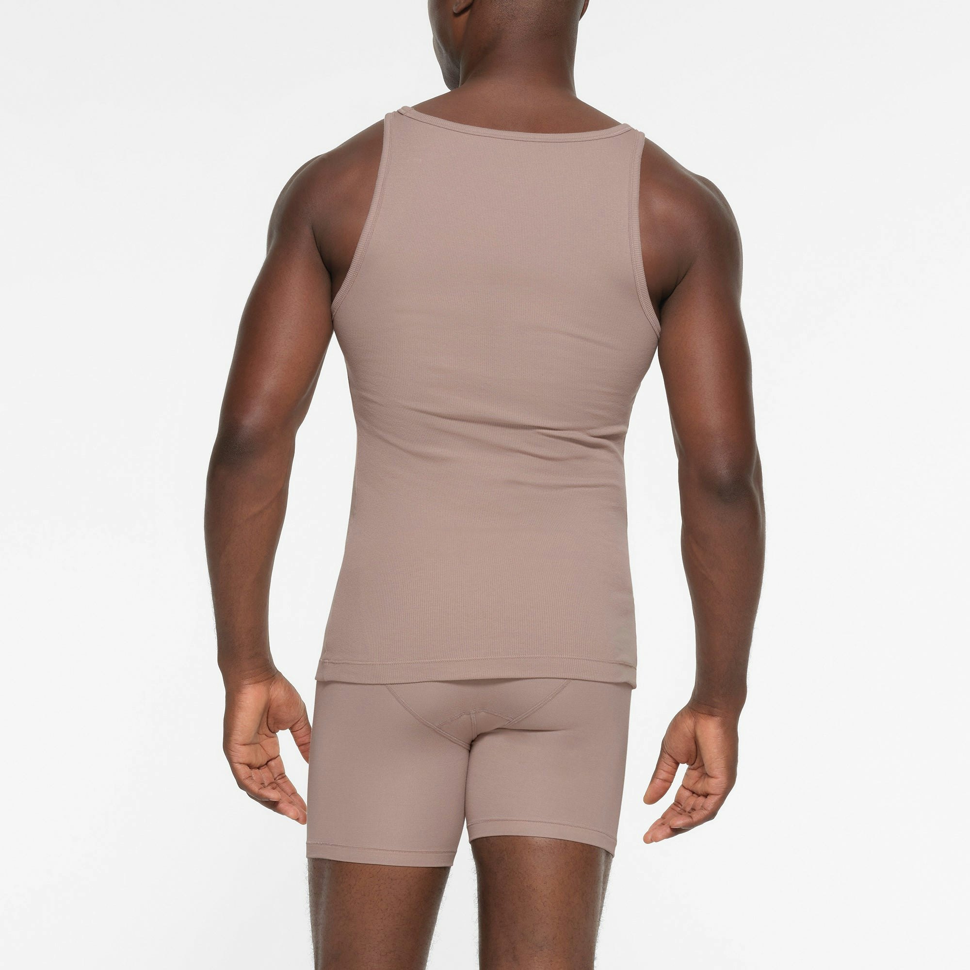 SKIMS COTTON MENS RIB TANK 3-PACK | FAWN MULTI ON A MODEL BACK VIEW
