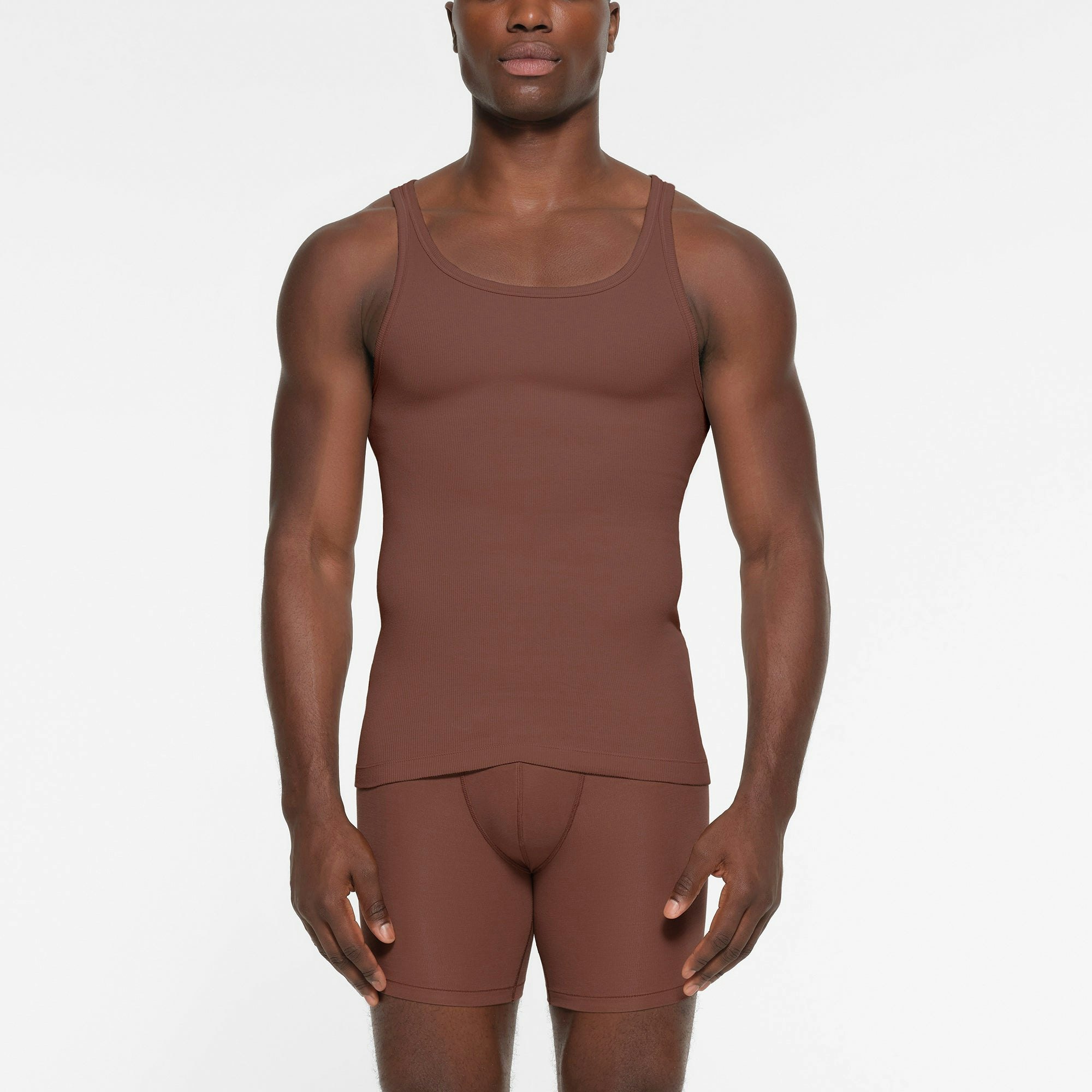 SKIMS COTTON MENS RIB TANK 3-PACK | FAWN MULTI ON A MODEL FRONT VIEW