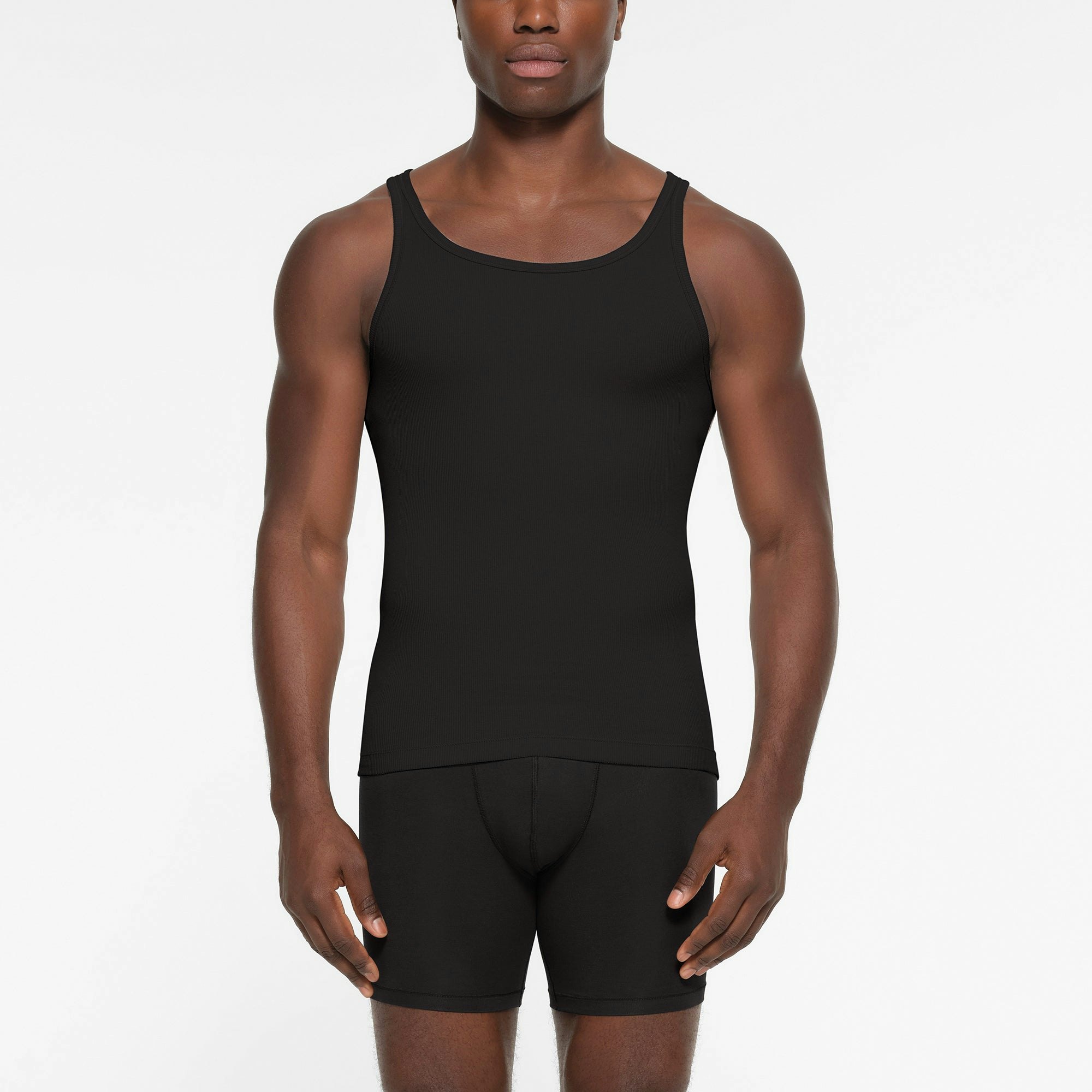 SKIMS COTTON MENS RIB TANK 3-PACK | FAWN MULTI ON A MODEL FRONT VIEW