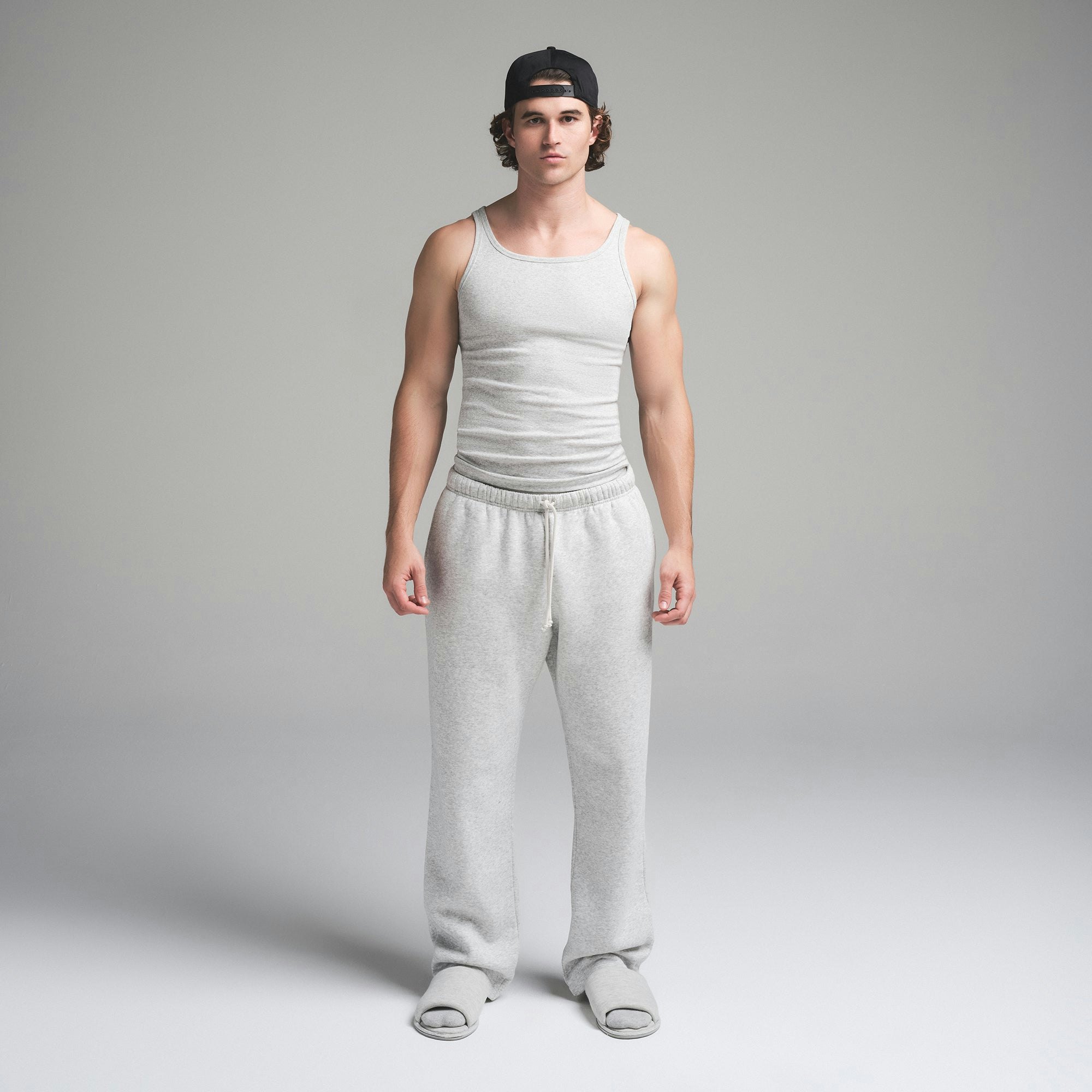 SKIMS COTTON MENS RIB TANK 3-PACK | HEATHER MULTI ON A MODEL FRONT VIEW | FOCUS: 0.0, 1.0, 0.9